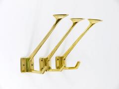 Three Handcrafted Art Nouveau Brass Wall Coat Hooks, Austria, circa 1910
