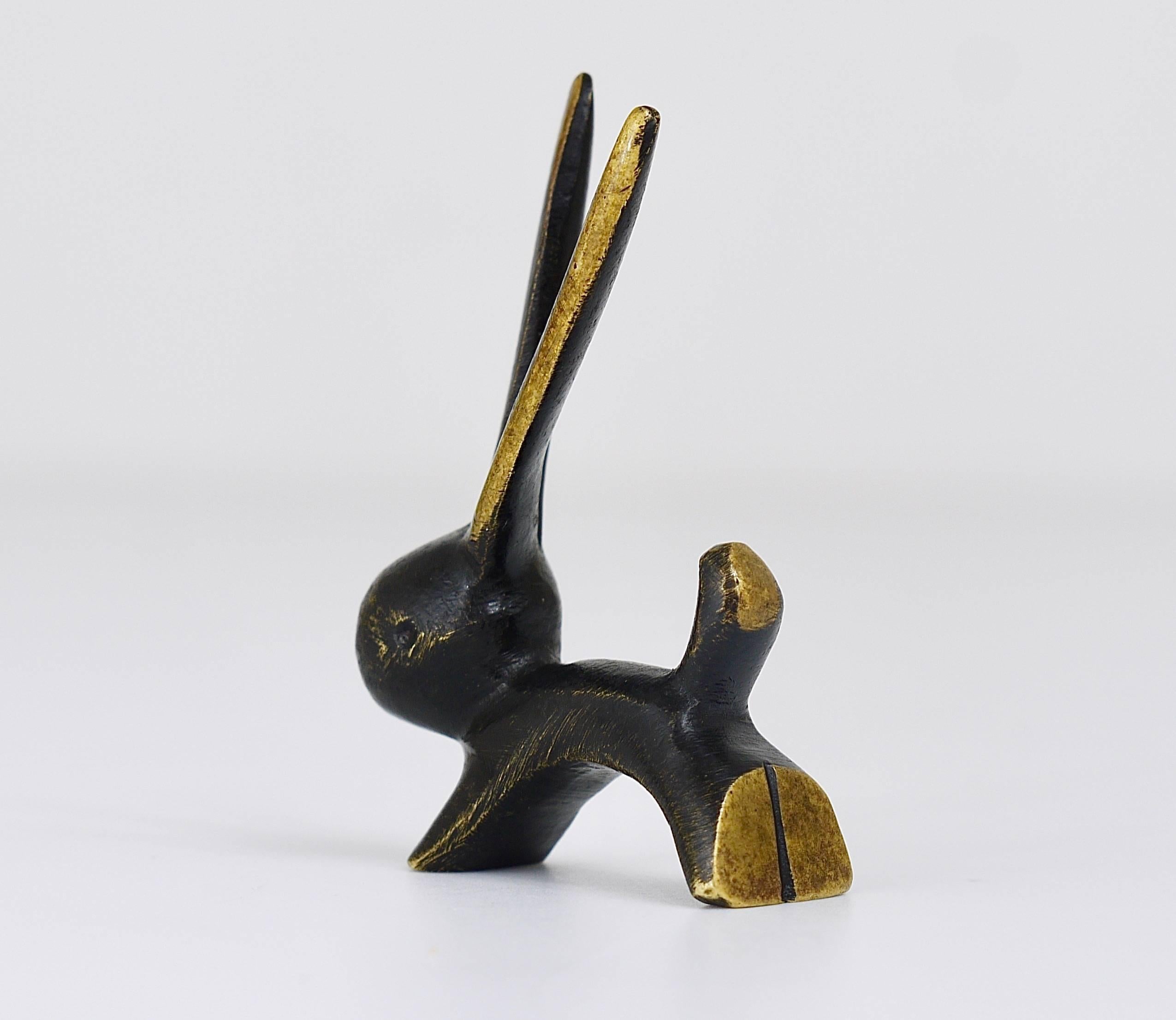 A lovely brass sculpture, displaying a little rabbit. Designed by Walter Bosse, executed in the 1950s by Hertha Baller in Austria. In very good condition. We offer other Walter Bosse brass objects in our other listings.