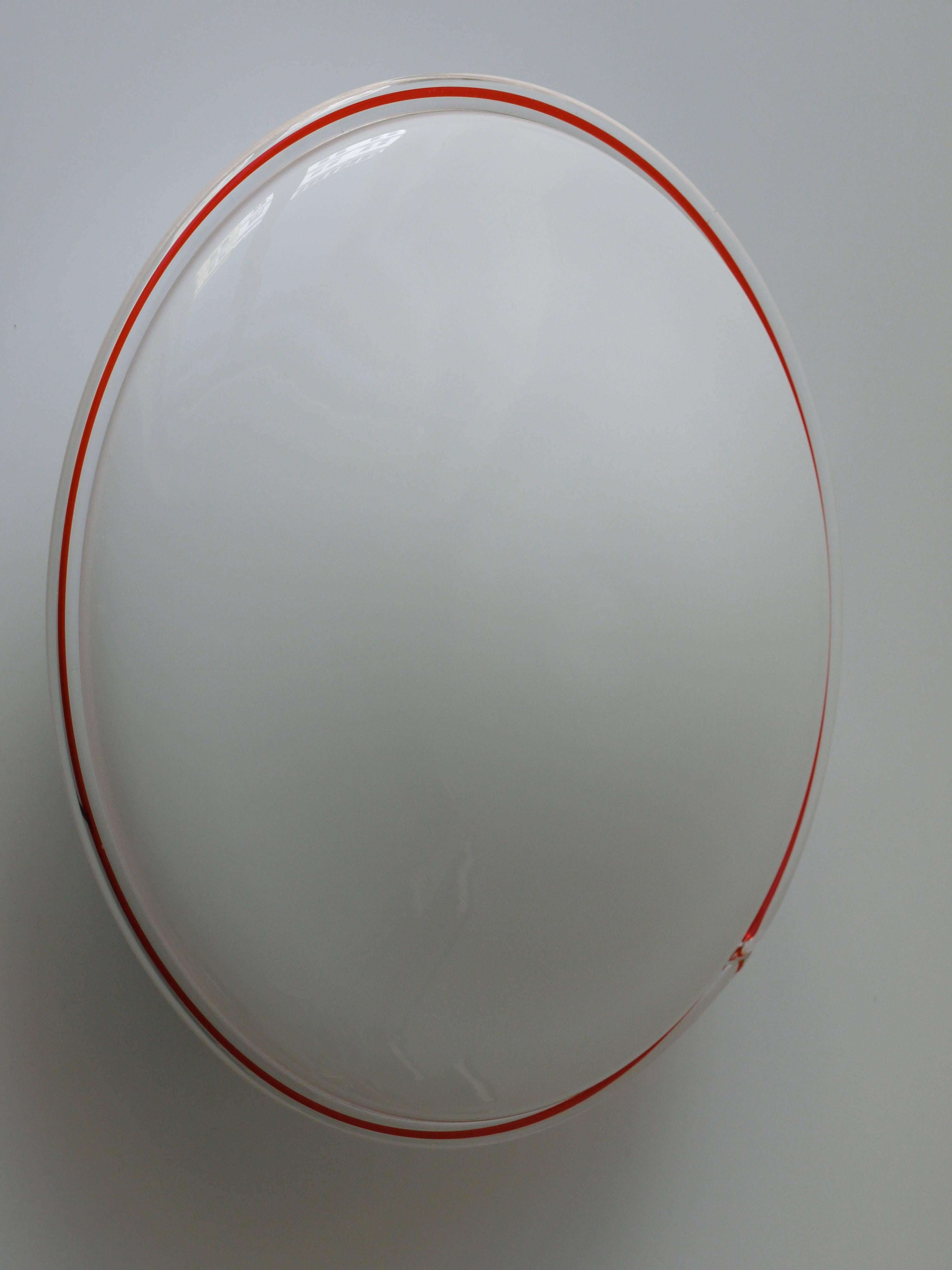 One Mid-Century lamp with beautiful handblown lampshades, made of white, and clear Murano glass with a nice red stripe around. To be used as a wall light or flush mount. Made in Italy in the 1970s. In excellent condition. One light available. In the