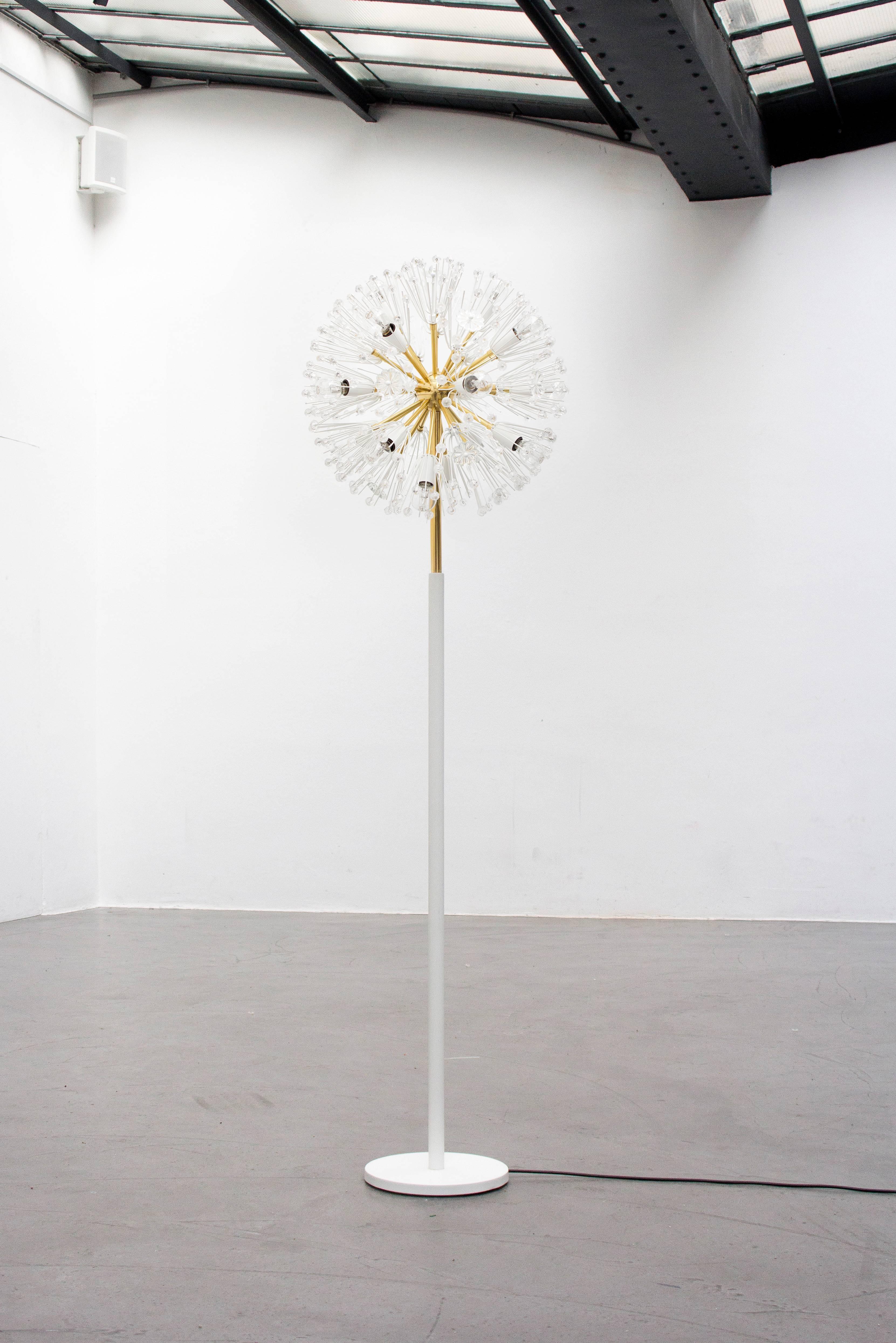 A beautiful and rare Austrian Mid-Century blowball Sputnik floor lamp from the 1950s, designed by Emil Stejnar, executed by Rupert Nikoll in Vienna. Made of brass, fully covered with Austrian crystal balls and glass flowers. This floor lamp has 17