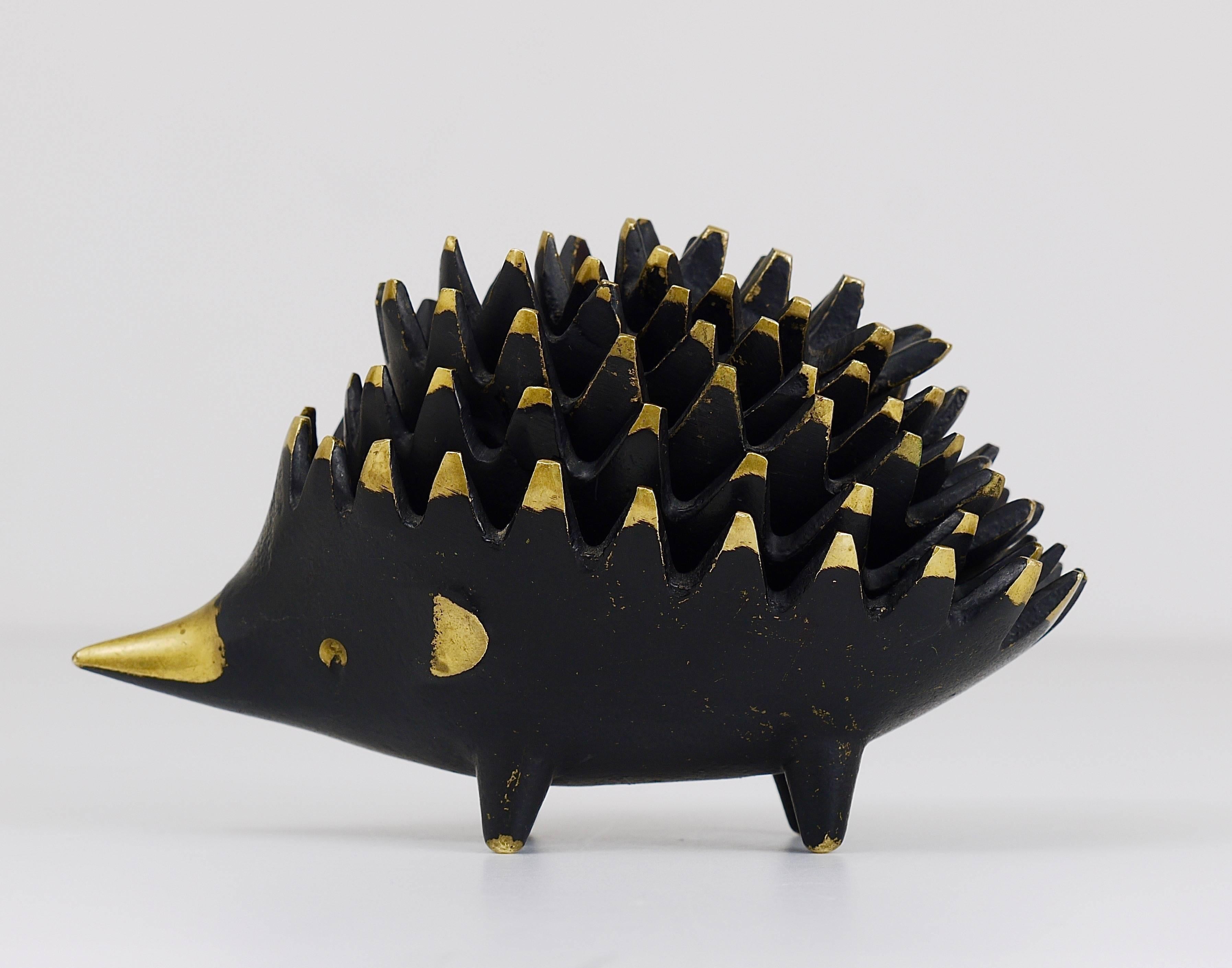 A complete set of six stackable hedgehog ashtrays. A very humorous design by Walter Bosse, executed by Hertha Baller Austria in the 1950s. Made of brass, in good condition with nice patina.