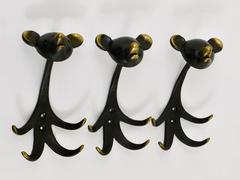 Two  Walter Bosse Brass Wall Hooks Displaying a Bear, Austria, 1950s