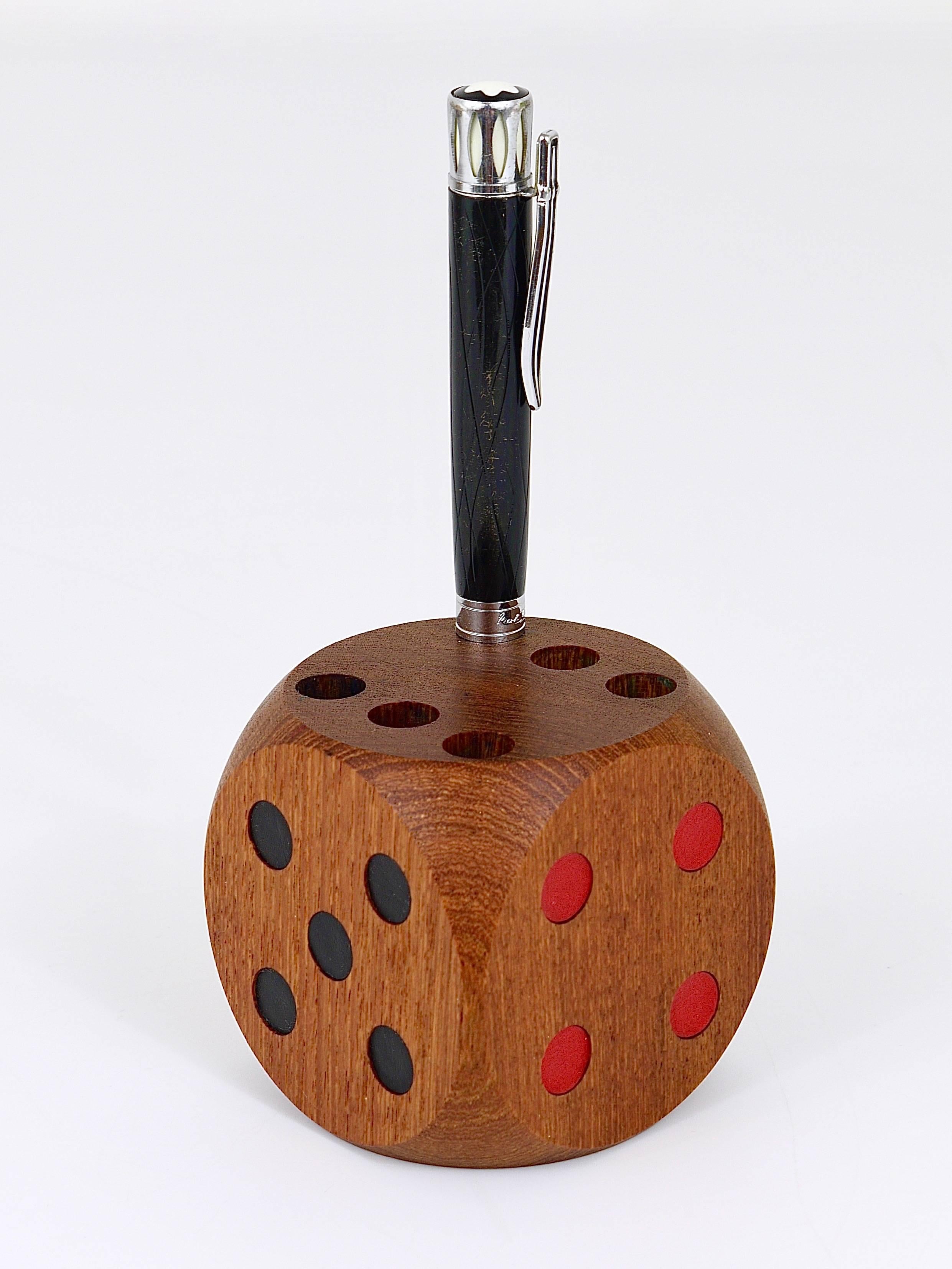A beautiful and decorative Scandinavian cube-shaped dice pen and pencil holder, Denmark, 1950s. Made of teak wood, in excellent condition.