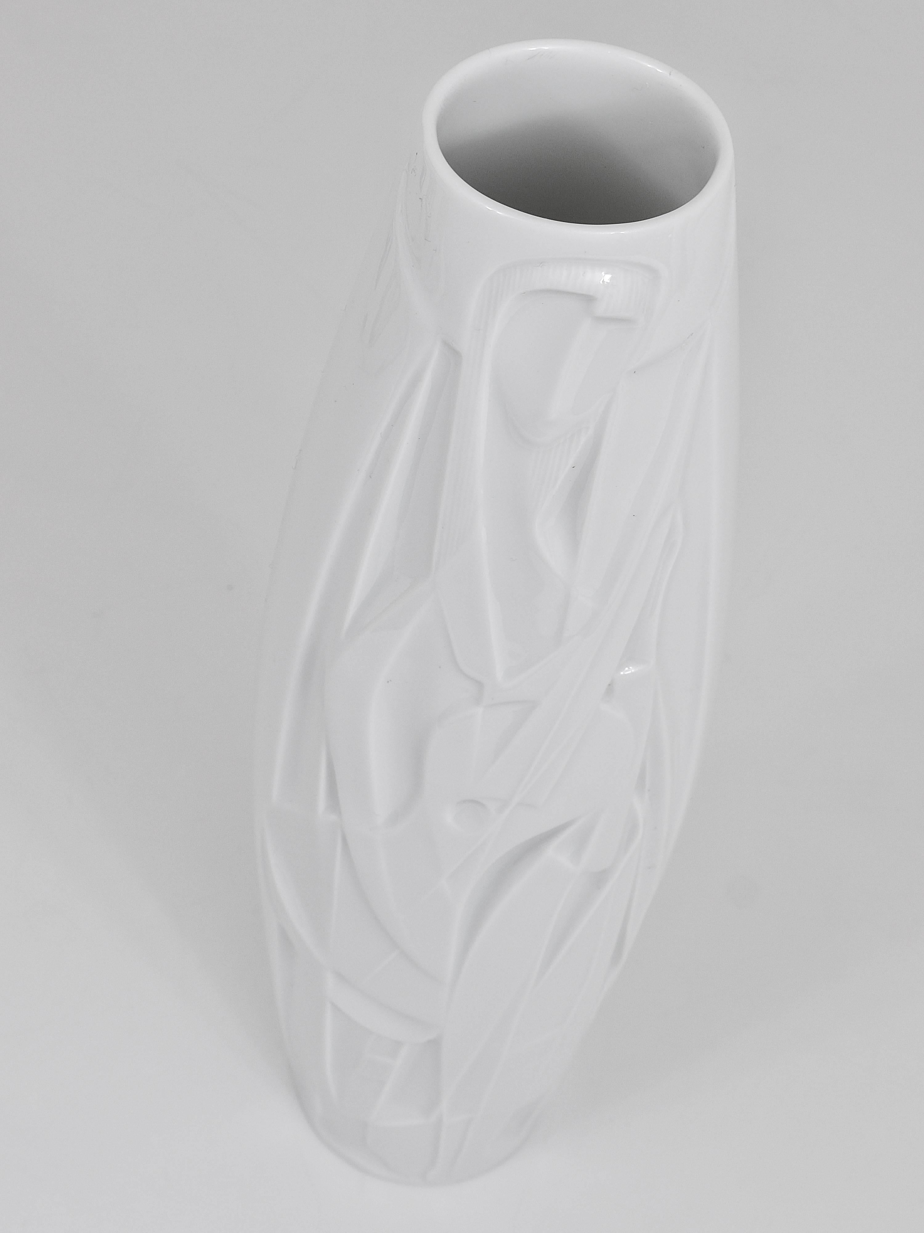 A beautiful white porcelain vase the lute player with shiny glaze from the 1960s, designed by Cuno Fischer, executed by Rosenthal Studio-Line, Germany. In very good condition.