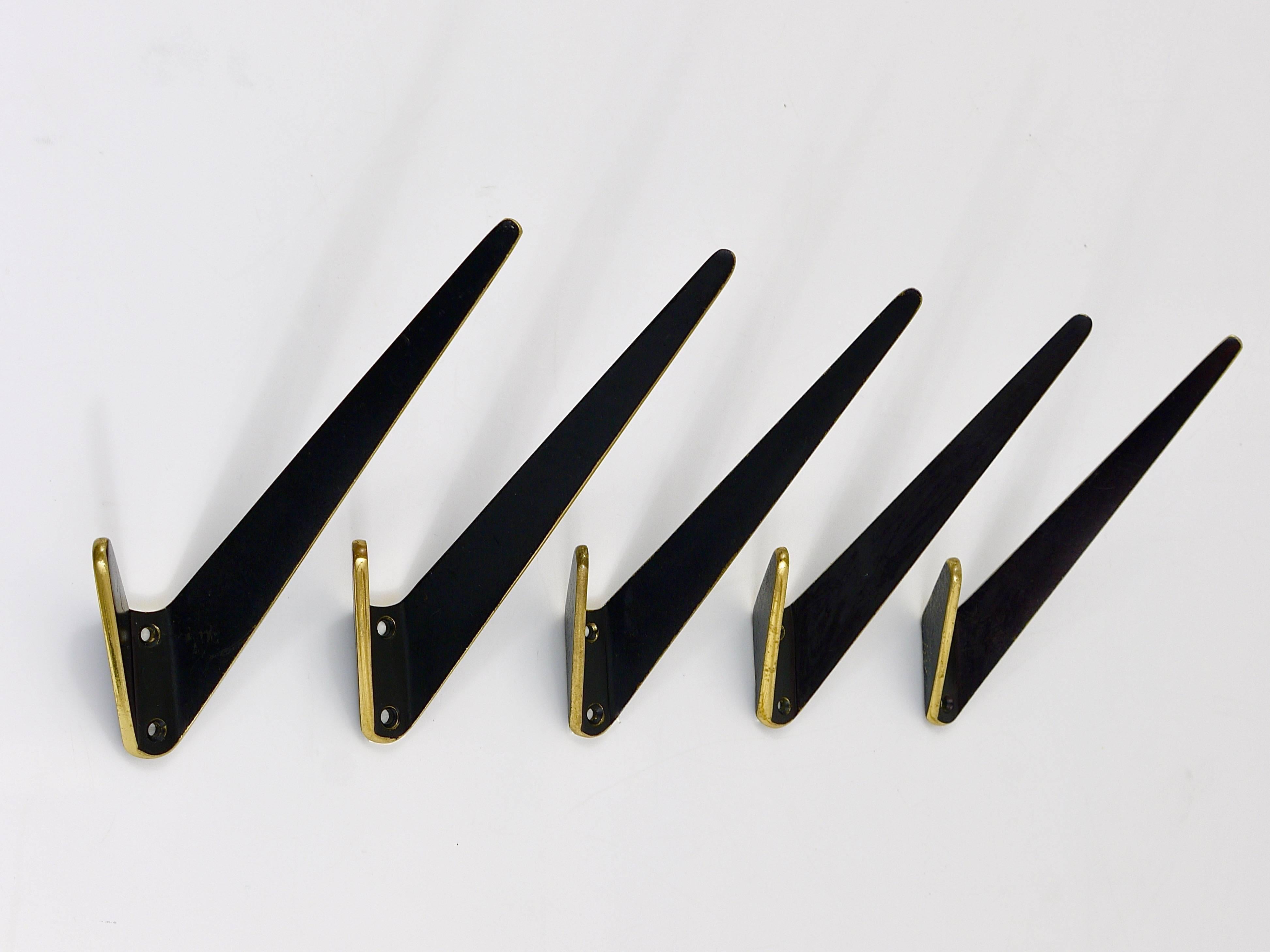 Austrian Up to Eight Asymmetrical Midcentury Black Brass Wall Hooks, Austria, 1950s For Sale