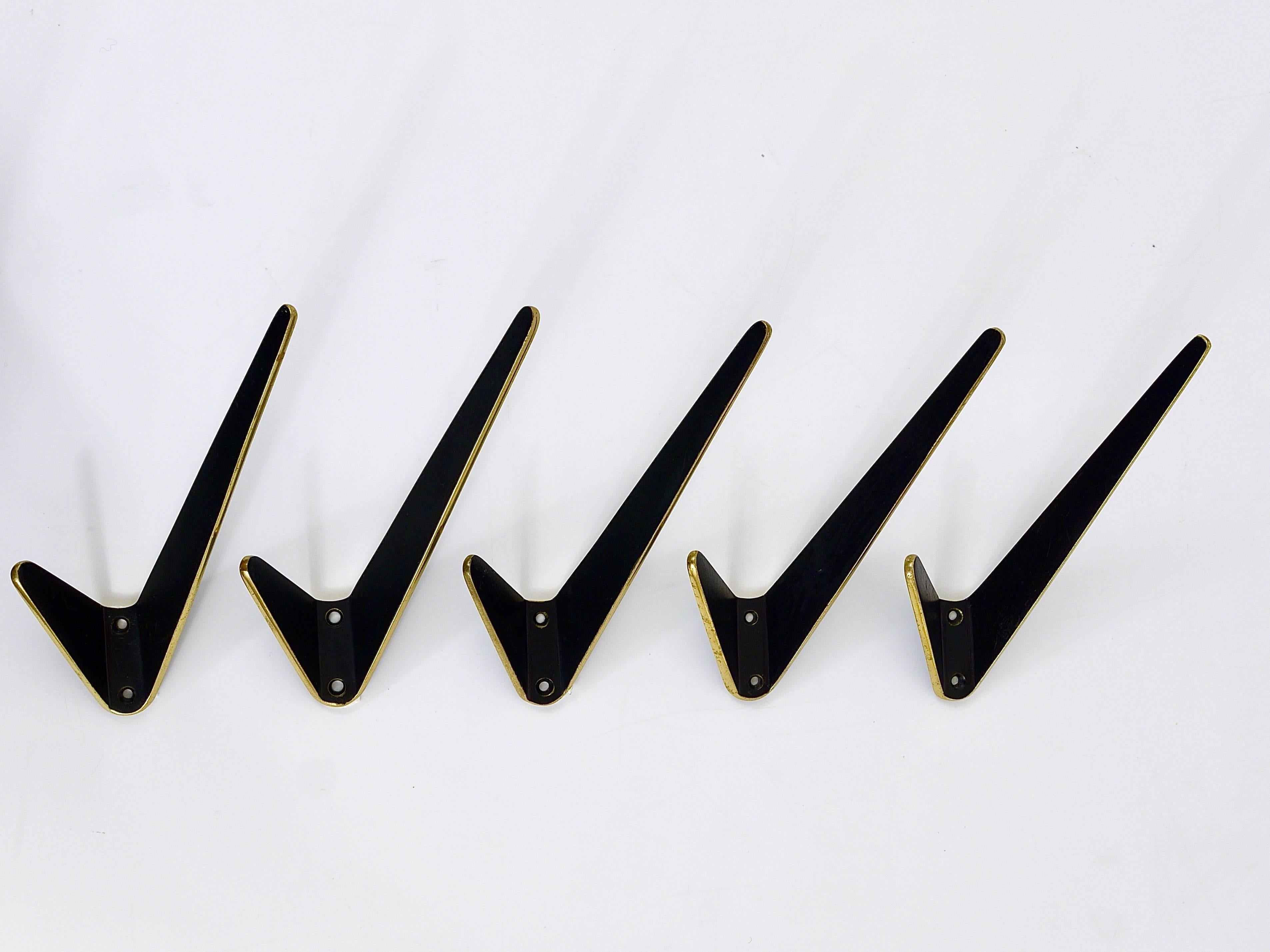 Mid-Century Modern Up to Eight Asymmetrical Midcentury Black Brass Wall Hooks, Austria, 1950s For Sale