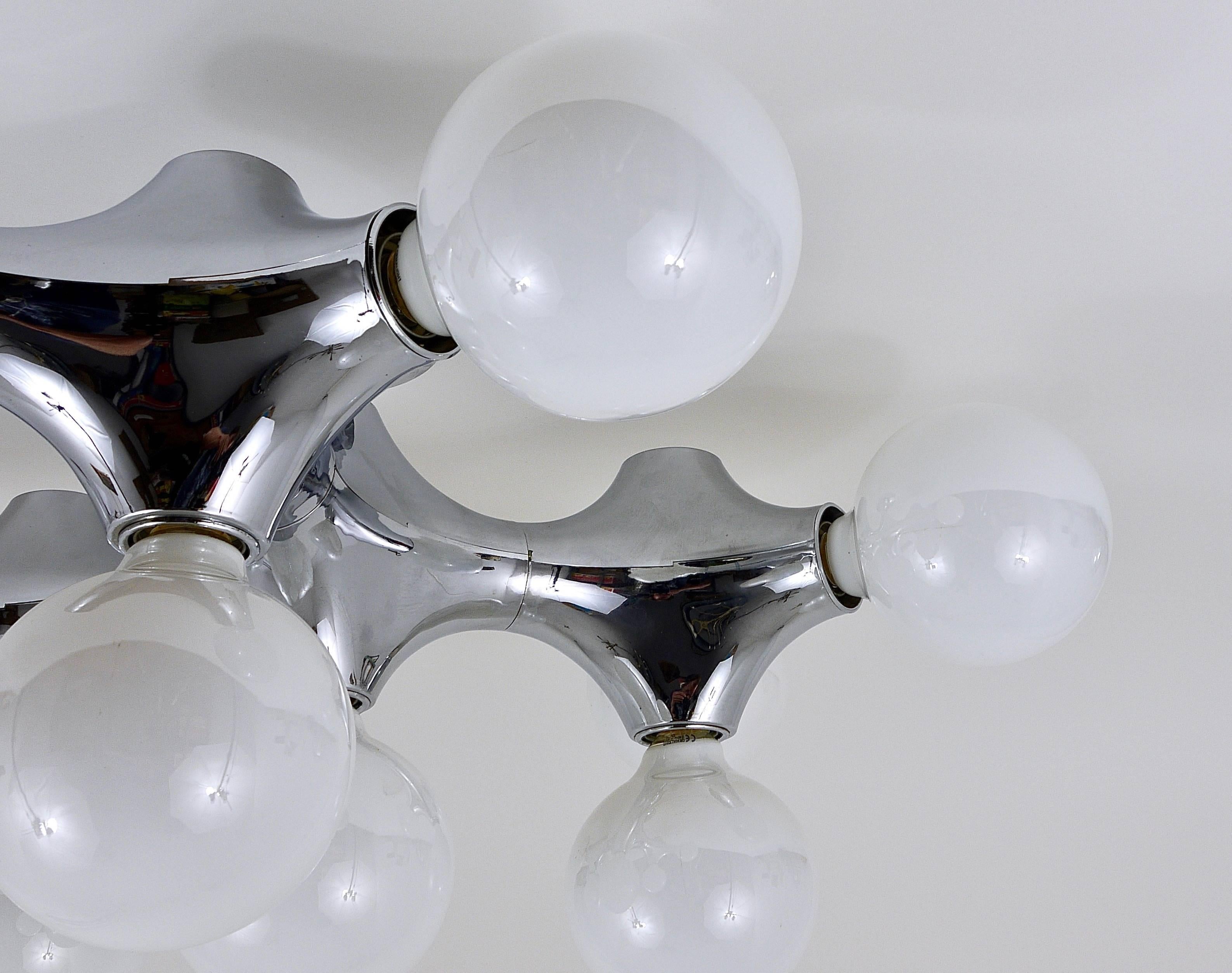A beautiful Space Age lamp from the 1970s by Cosack, Germany. Made of chrome-plated plastic. A stunning piece, in excellent condition with very marginal wear. The lamp takes ten large Edison base bulbs. A very stylish light.