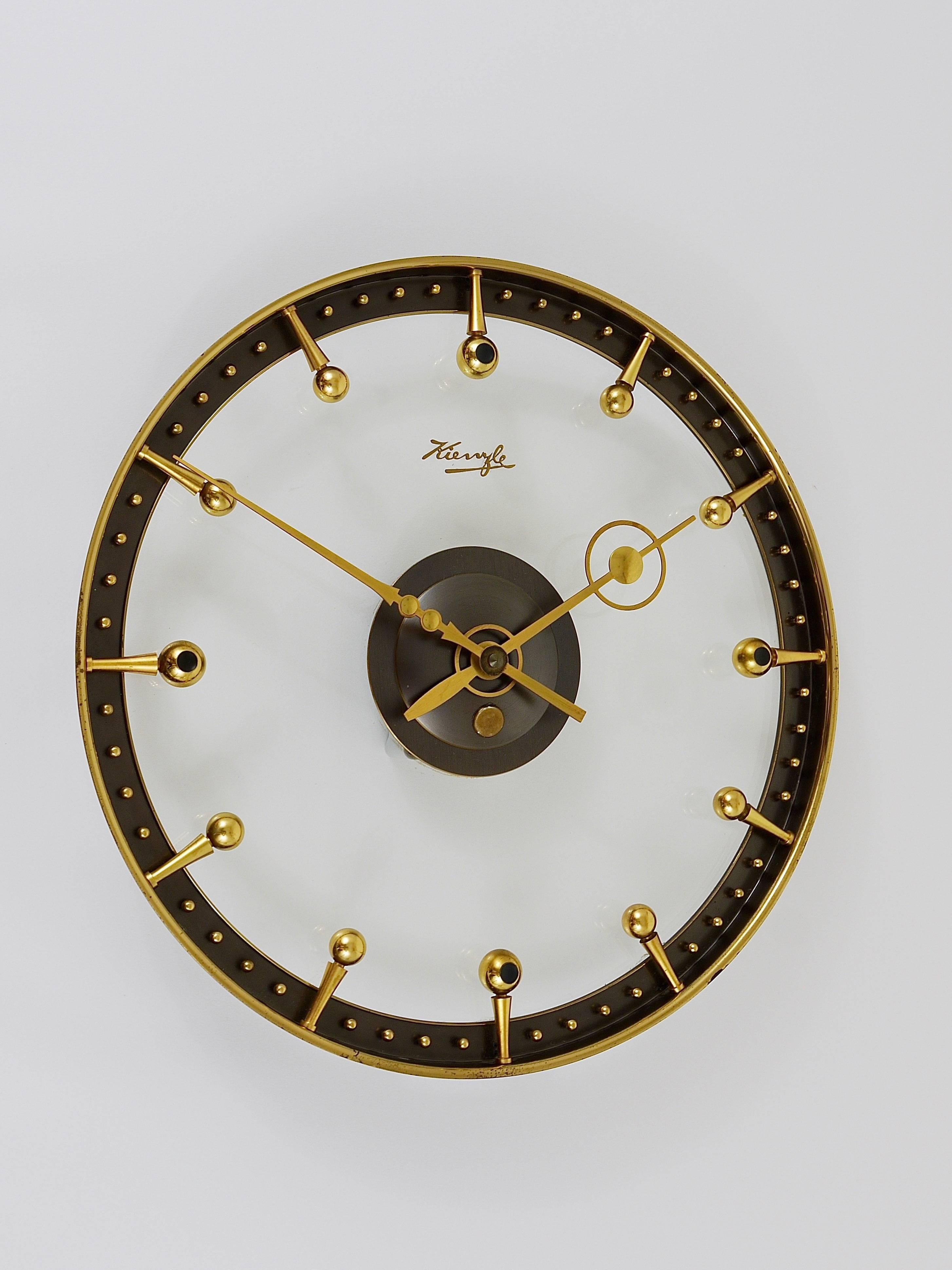 modern brass wall clock