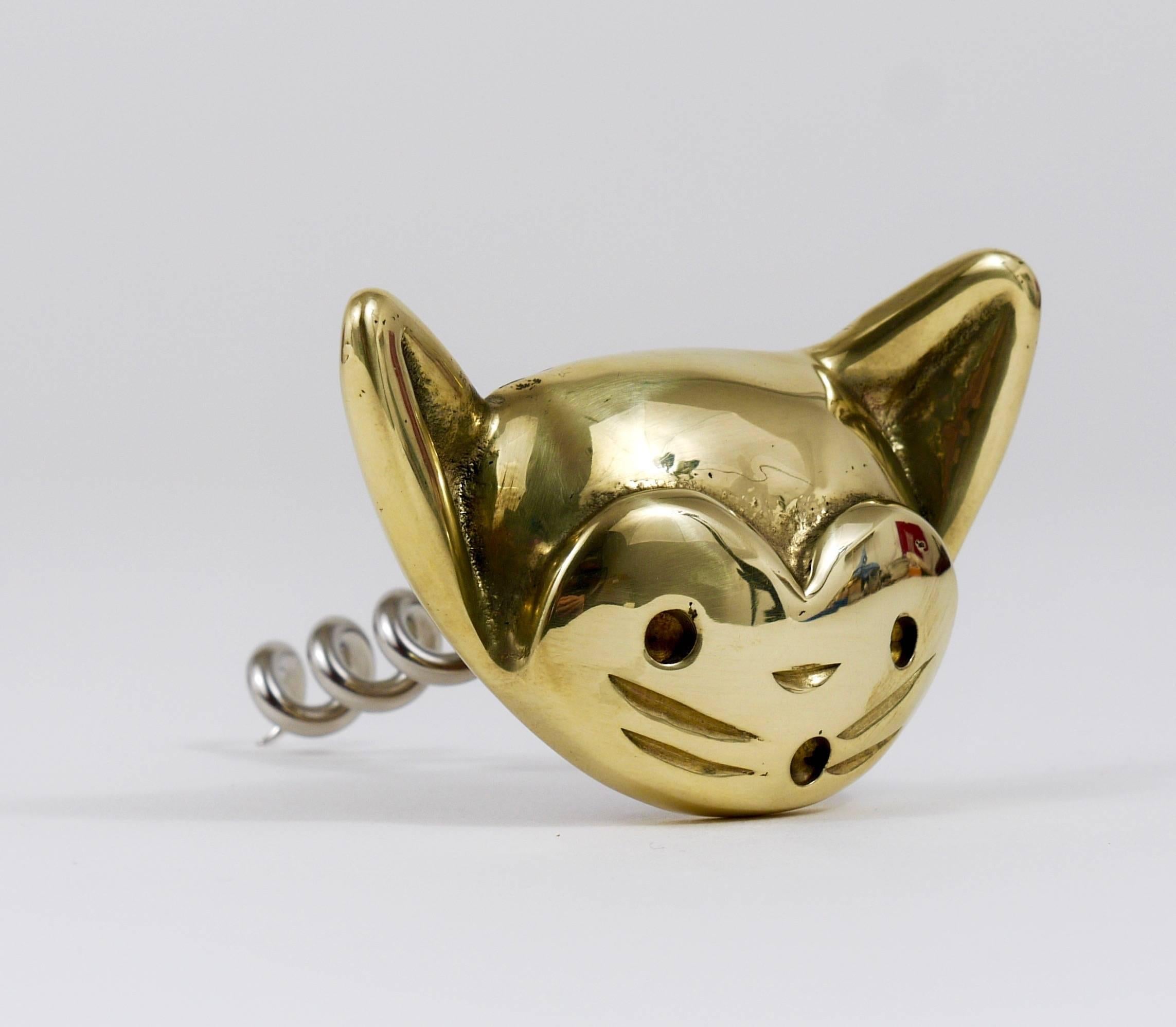 A charming Mid-Century bottle opener / cork screw, displaying a cat. A very humorous design by Walter Bosse, executed by Hertha Baller Austria in the 1950s. Made of polished brass, in very good condition.

 
