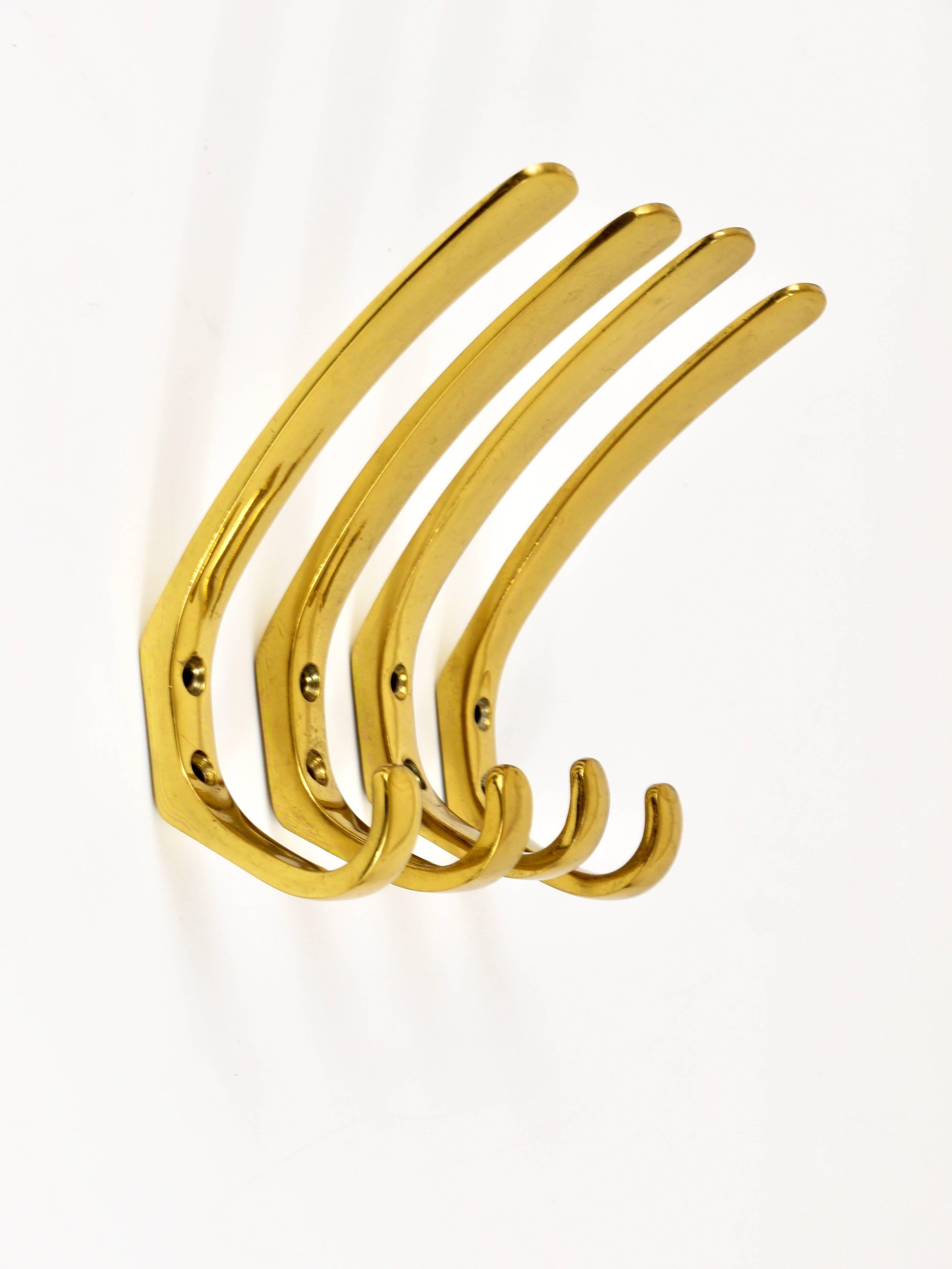 Up to six beautiful modernist brass wall hooks, executed in the 1950s by Hertha Baller, Austria. Solid brass in excellent condition. Six hooks are available, sold and priced per piece.