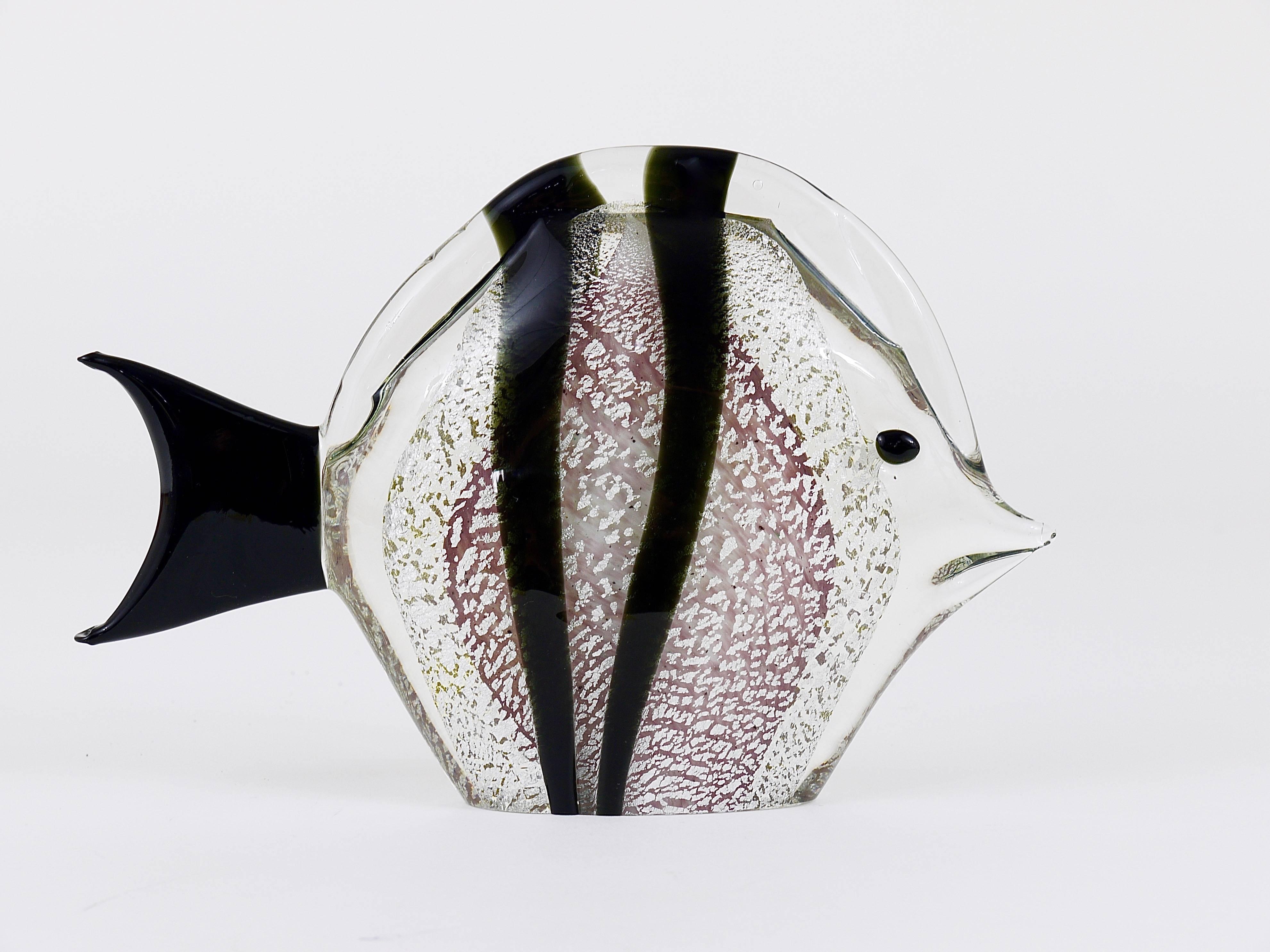 A beautiful handblown fish sculpture by Mario Badioli from the 1970s. Made of clear, black and purple Murano glass with silver flakes. In excellent condition, signed on its underneath.