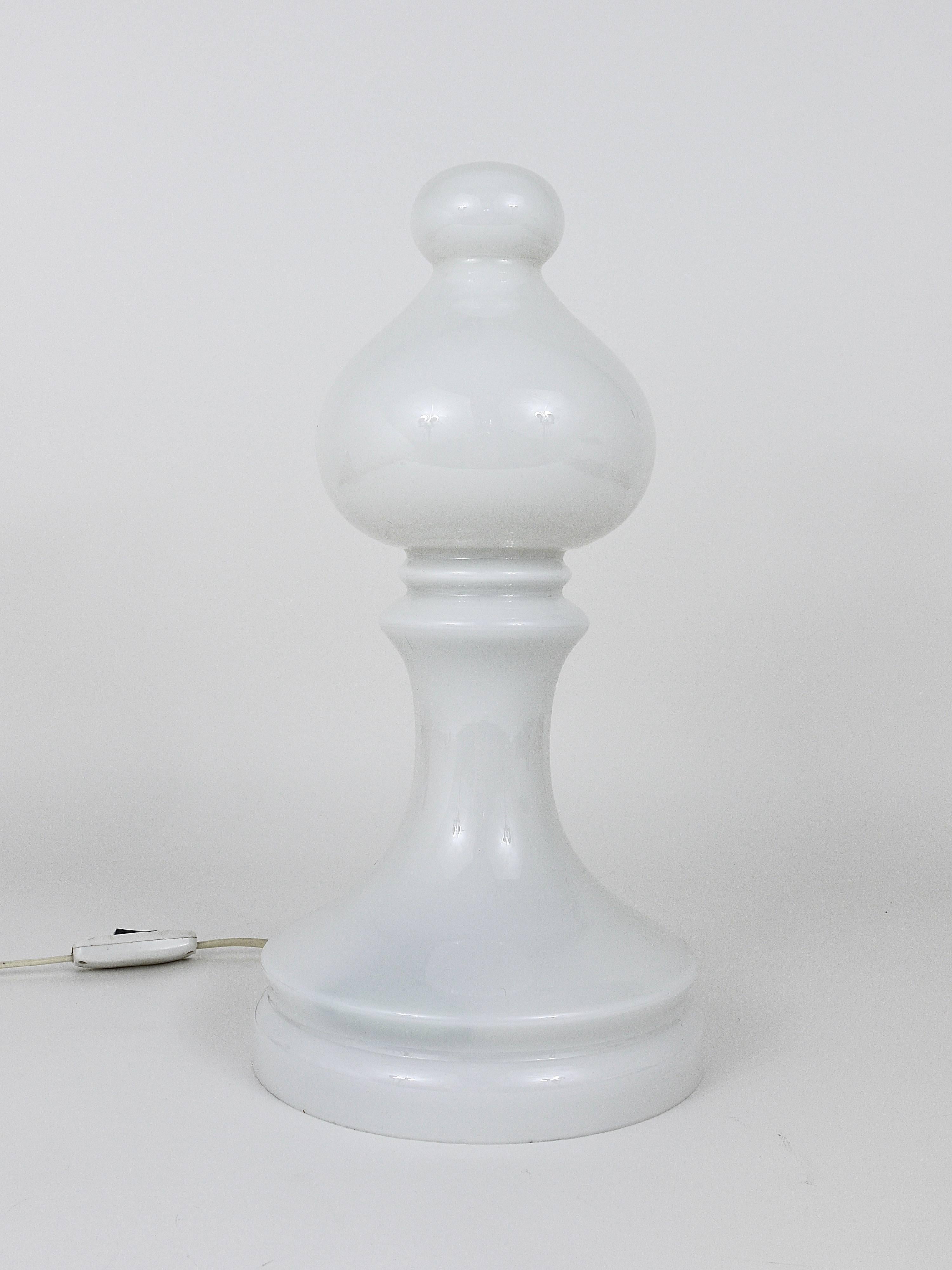 A beautiful and decorative table or side lamp in the shape of a Bishop chess piece. Designed by Ivan Jakes, made of clear and white opal glass. Executed in the 1970s in Czechoslovakia. In very good condition.