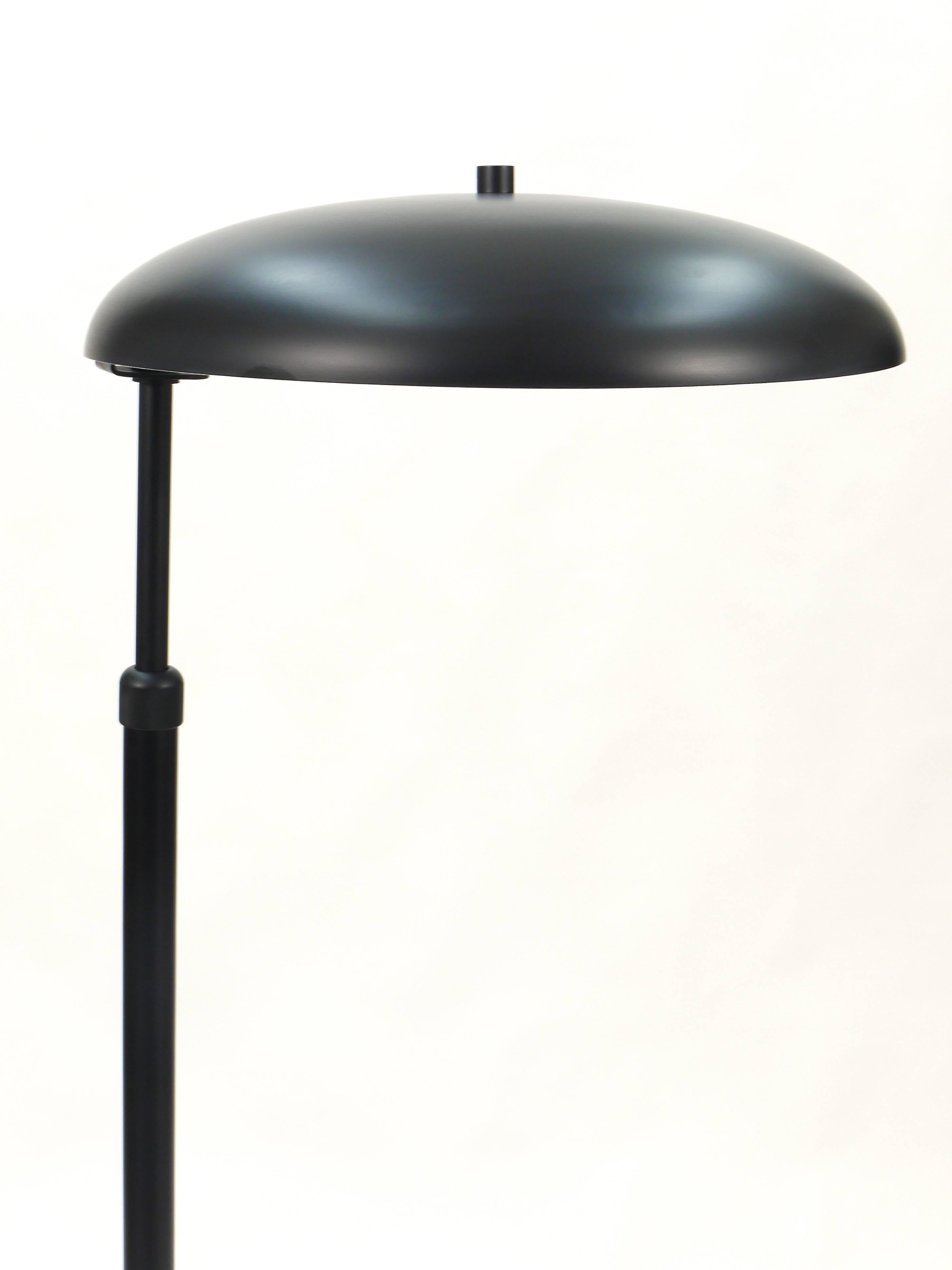 A beautiful telescope floor lamp, height adjustable, made in France in the 1950s. This lamp is height adjustable, professionally restored and rewired. In excellent condition.