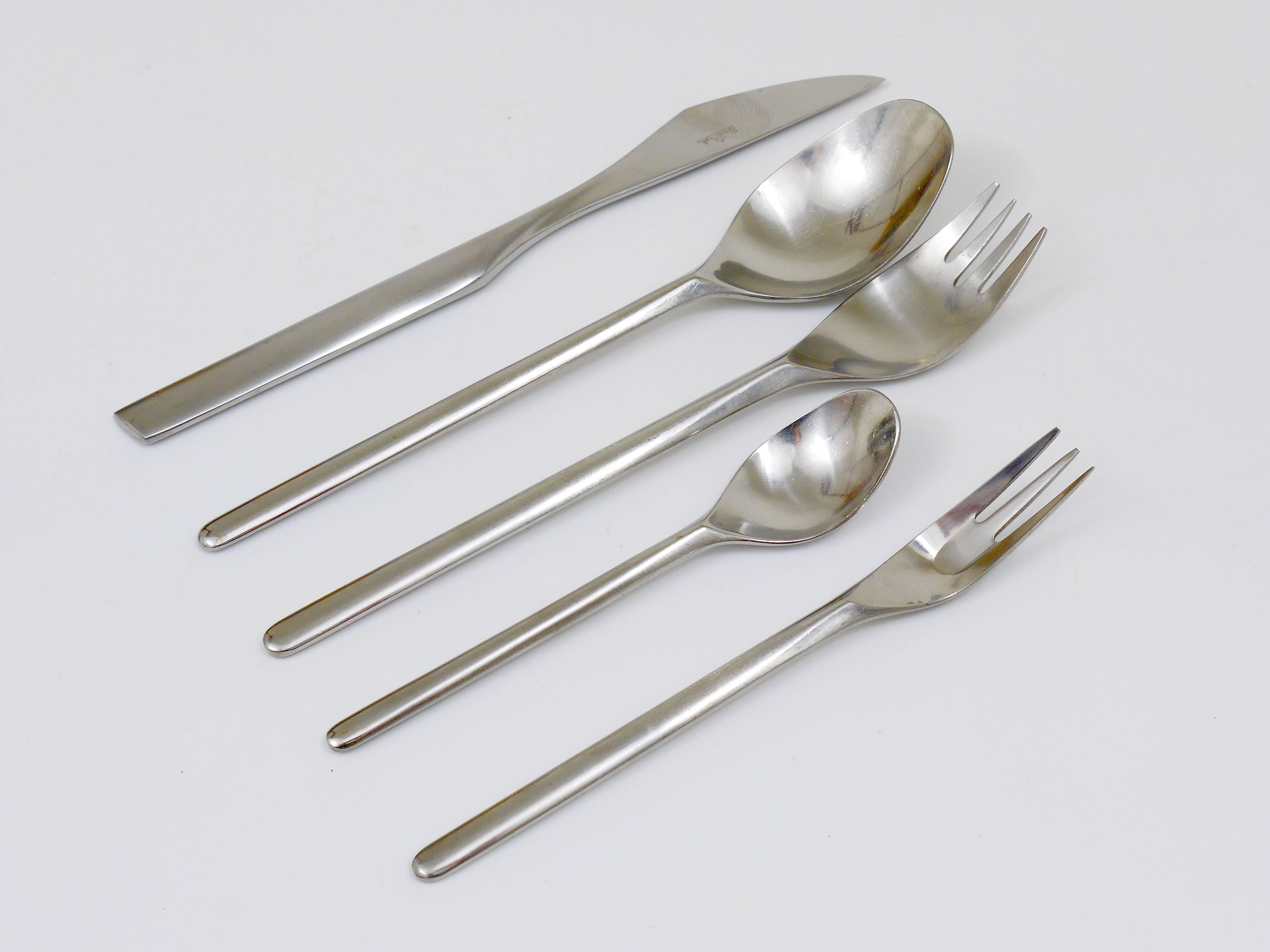 Beautiful modernist flatware, designed by Tapio Wirkkala in 1963, executed by Rosenthal Germany. High-quality flatware, made of stainless steel.  For 6 persons, consists of 6 big spoons, forks and knives and 6 small spoons and forks. 30 pieces. In