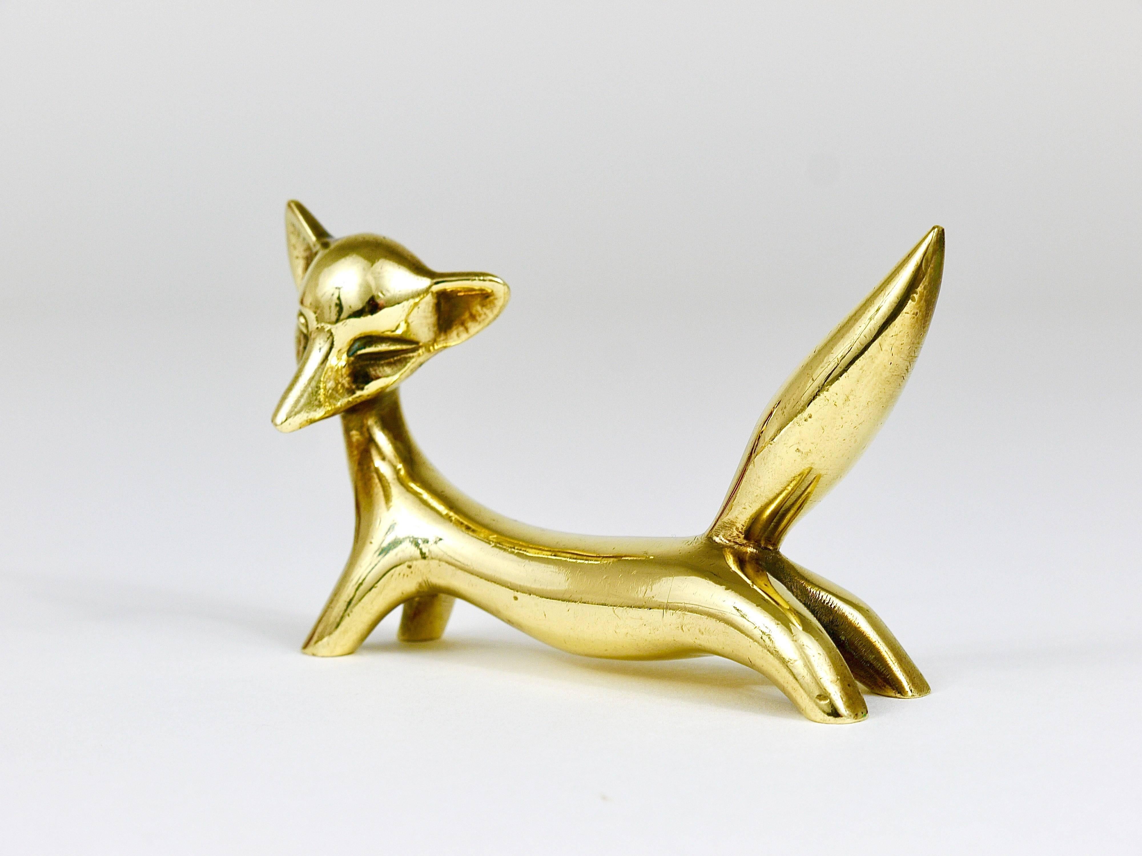 A lovely fox sculpture made of brass from the 1950s. Designed by Walter Bosse, executed by Hertha Baller, Austria. In good condition with charming patina. We offer more Walter Bosse brass objects in our other listings.