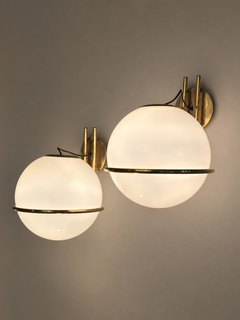 Pair of brass and glass wall sconces from 1960s Italy.