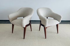 Élégante paire de fauteuils signée Charles Ramos, vers 1950
