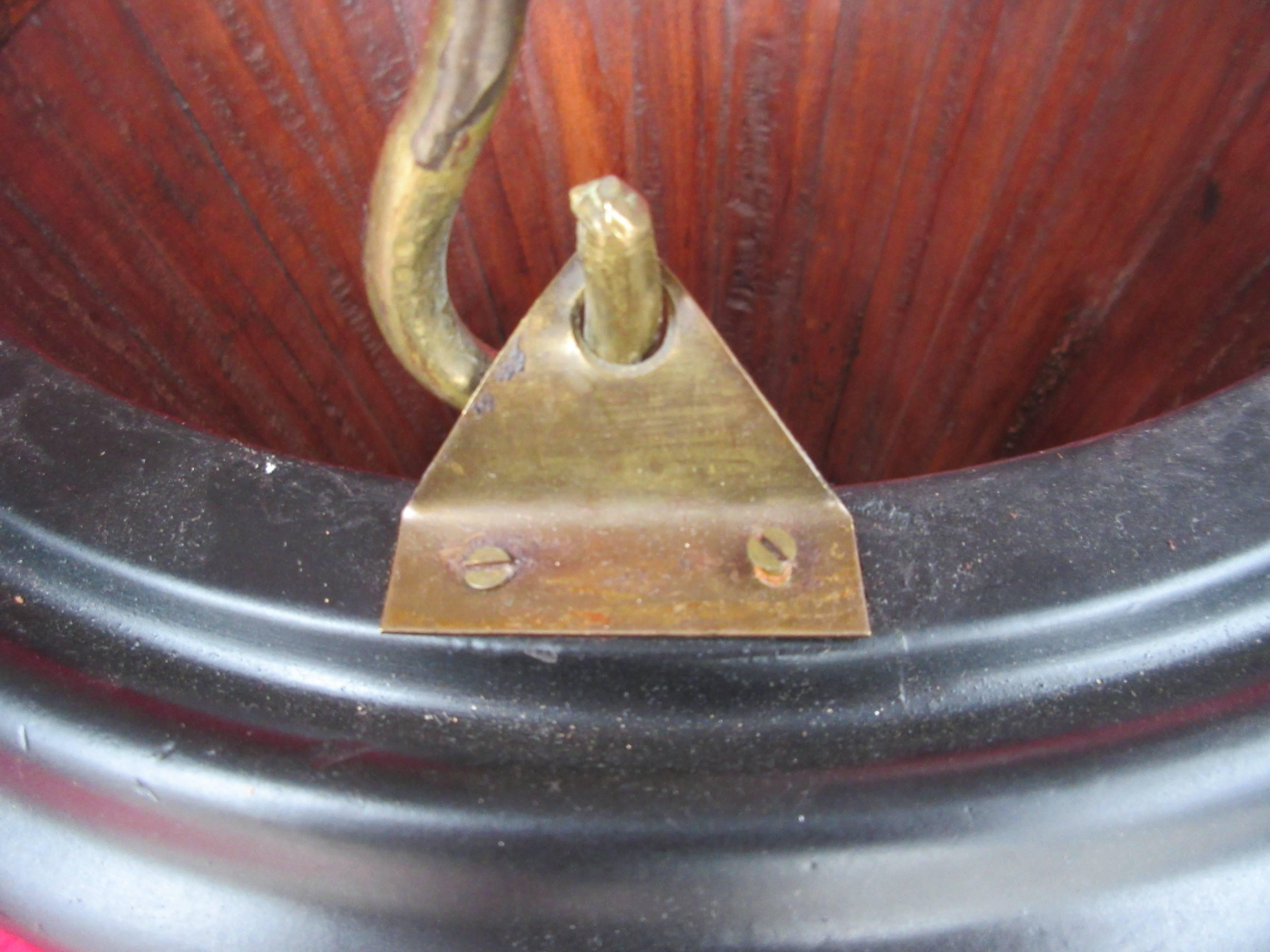 An attractive pair of early 19th century ribbed dutch kettle or peat buckets of coopered construction with a ribbed moulded body.

These early 19th century kettle or peat buckets in fruitwood and sycamore, with brass handle were originally used