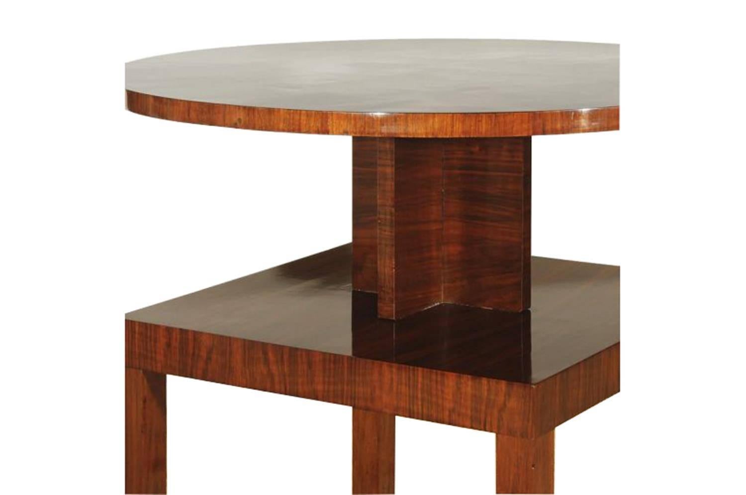 Exceptional side table from France of the 1930s. The upper top plate offers a unique chess pattern made of walnut wood. The table was costly renovated in our manufactory and the finish was polished in high gloss. Rare furniture piece and a real