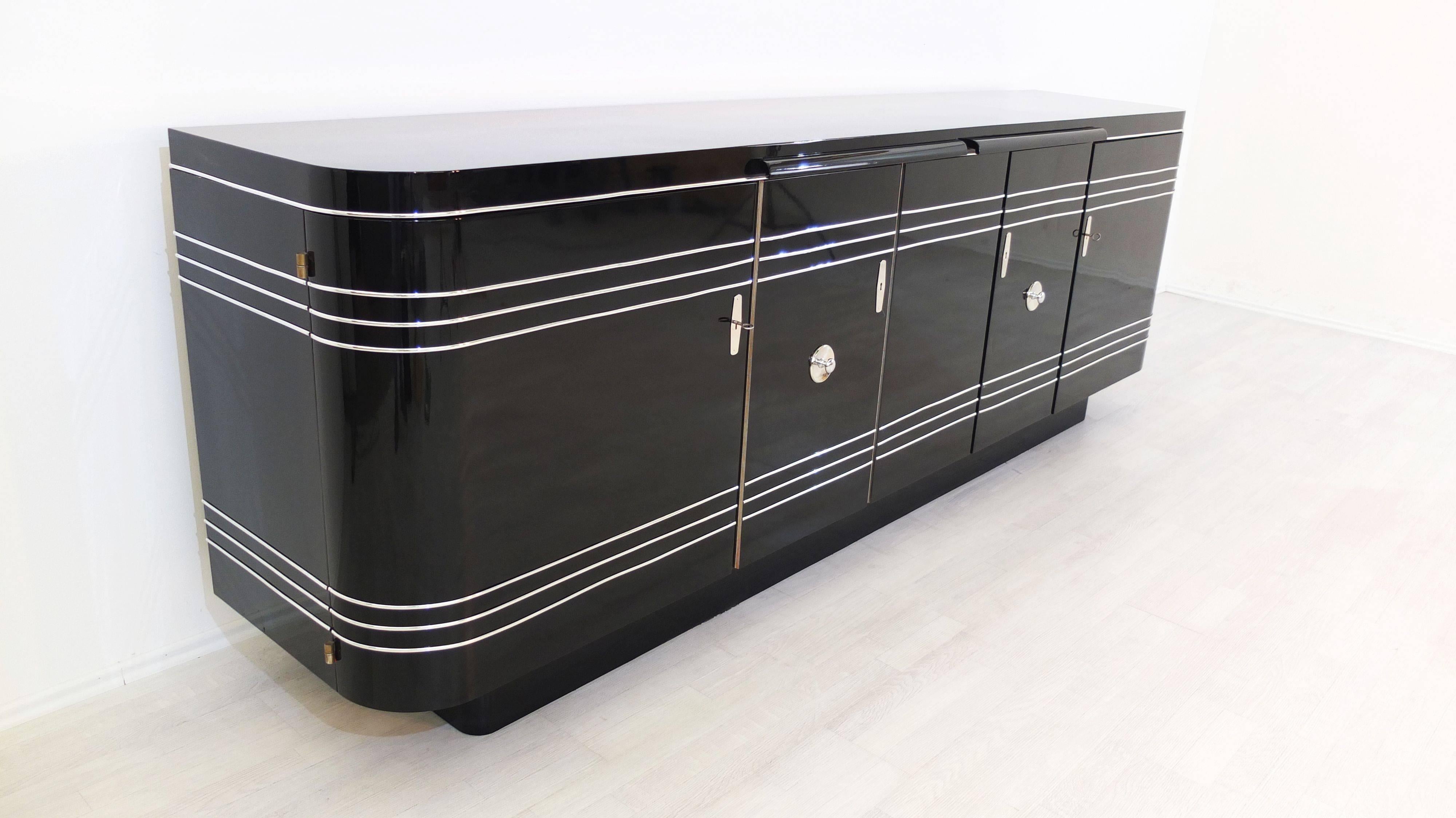 Large Art Deco style sideboard build after an original piece we already sold. Customizable in size, paintjobs and finishes. You can also choose a custom interior.

 - fine chromlines and high gloss piano lacquer
 - red interior with plenty of