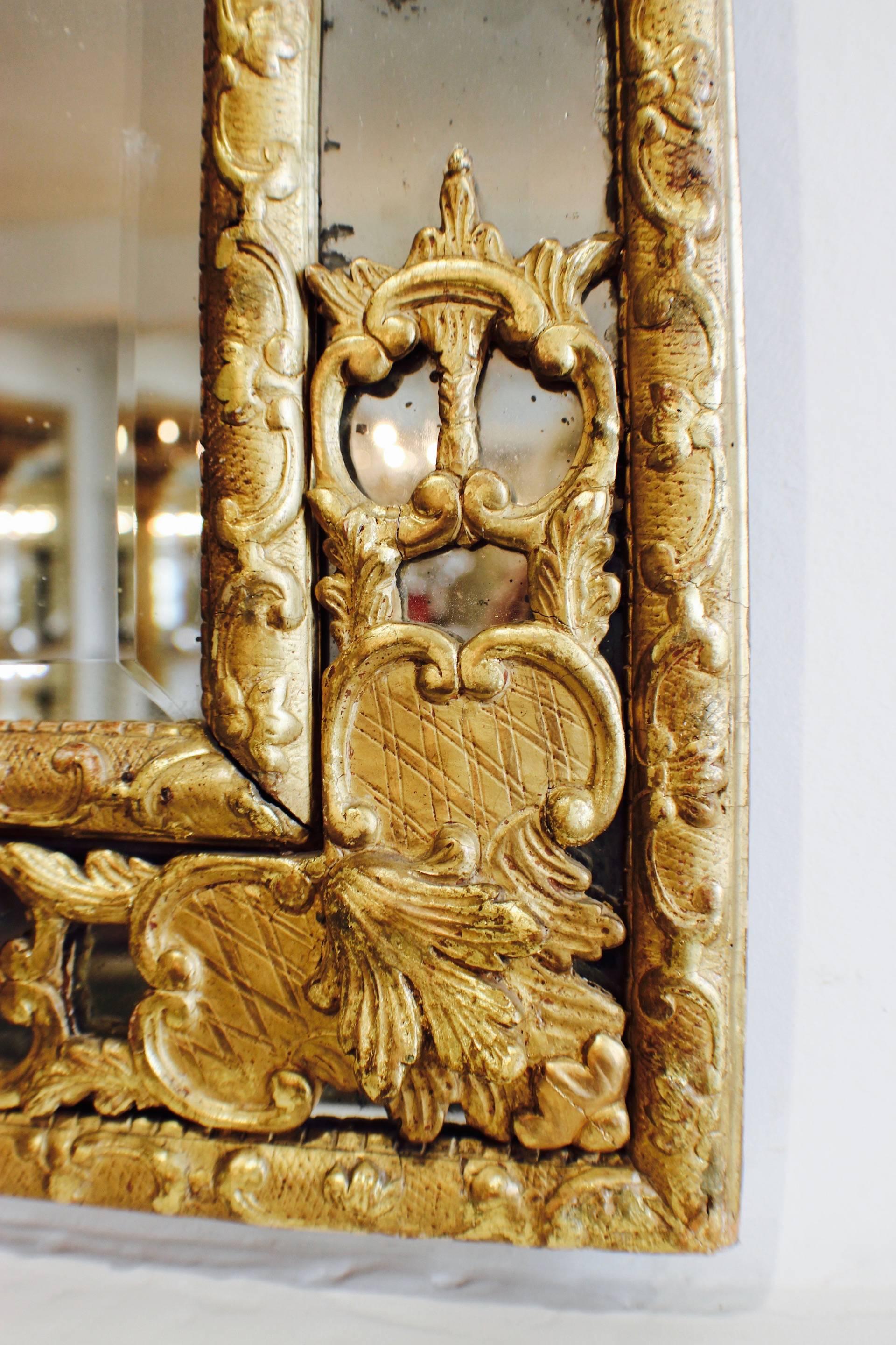 An unusual size Regence gilt-wood mirror, circa 1720-30 In Excellent Condition In Petworth, West Sussex