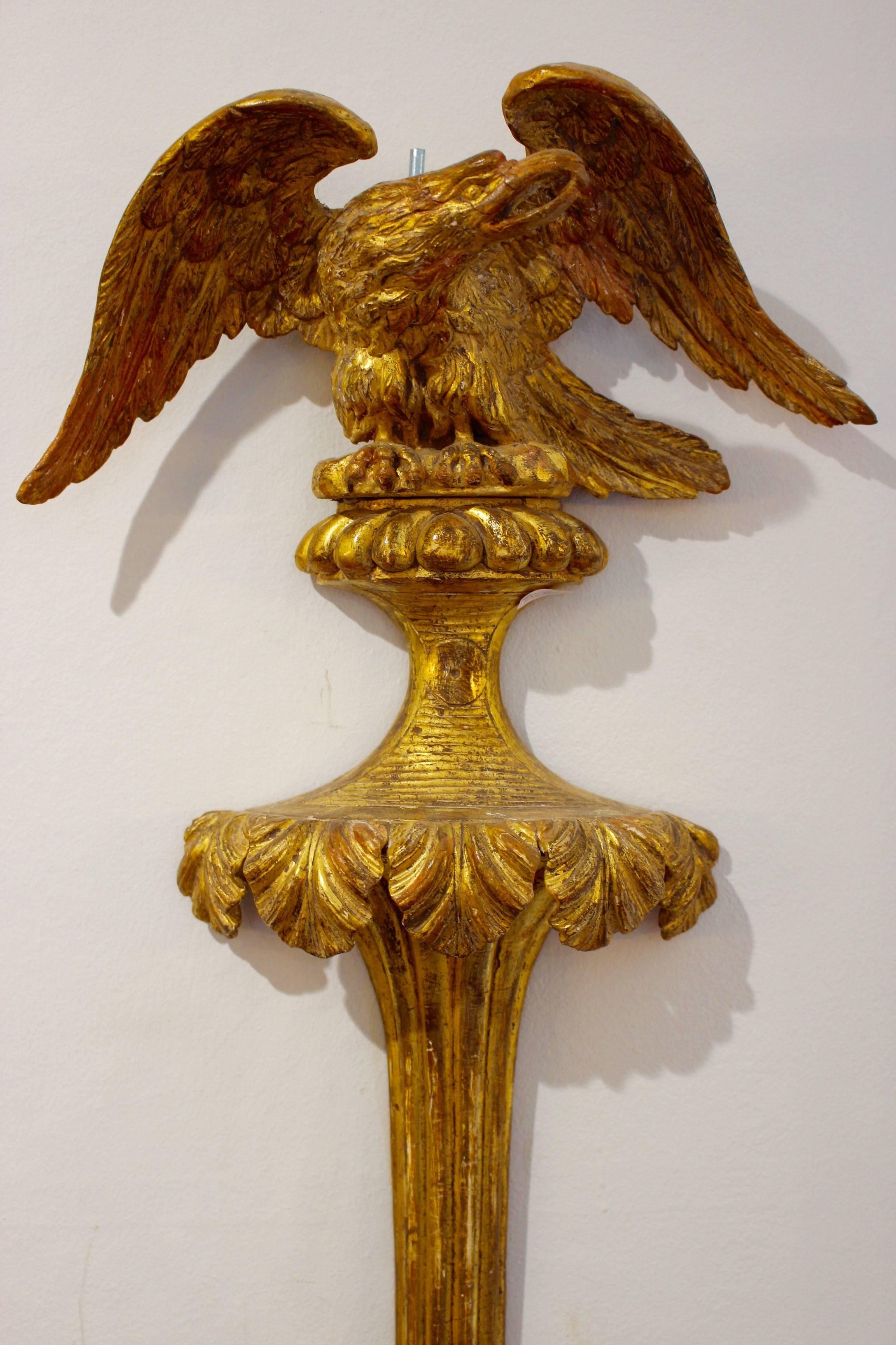 English Pair of George III carved gilt-wood twin branch wall lights, late 18th Century