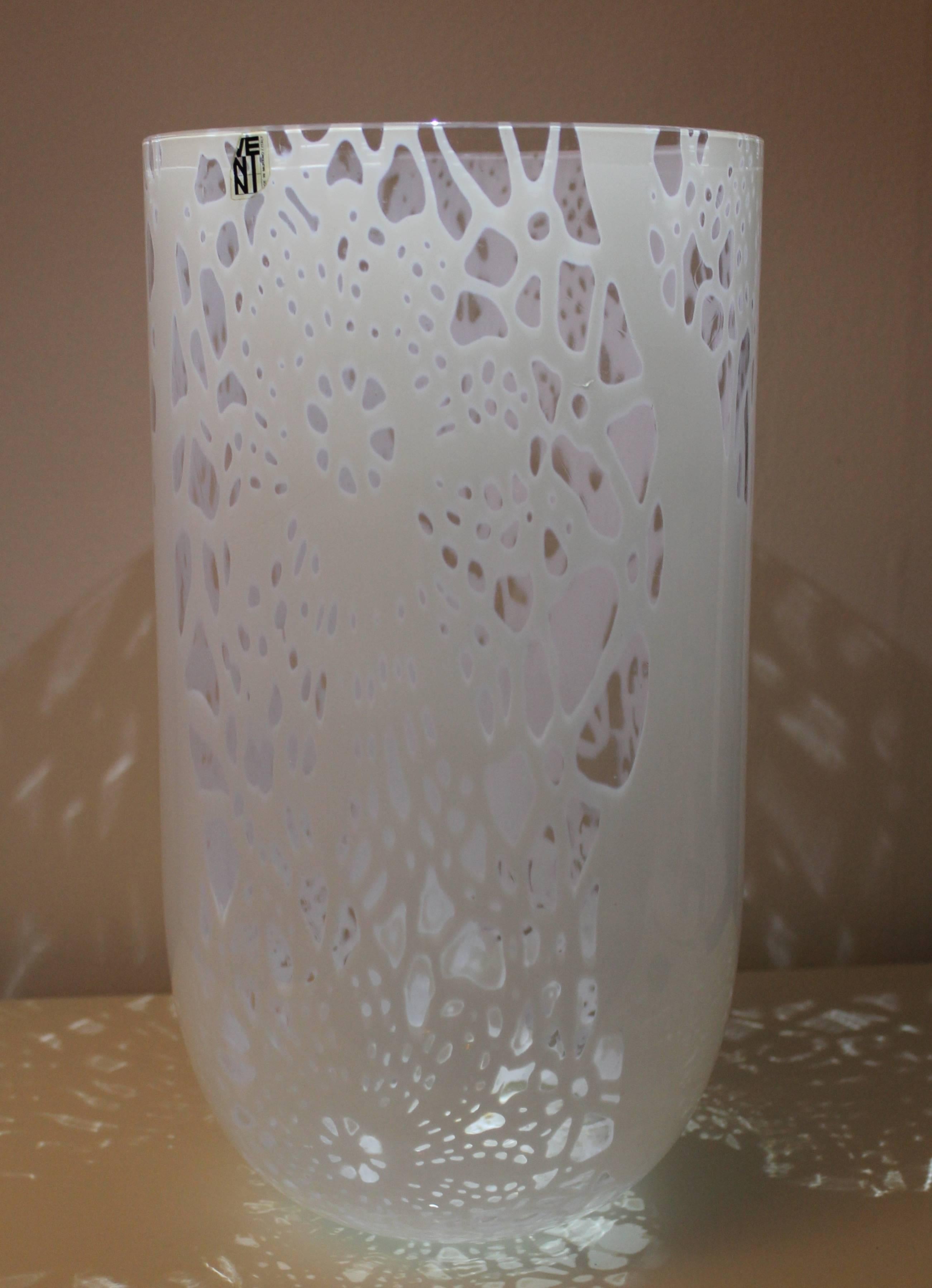 Remarkable 'merletto' vase by Owe Thorssen and Brigitta Karlsson for Venini Italia manufactures. Made by blown crystal and 'lattimo', engraved signature 'Venini Italia' on the base and originally labeled Venini.