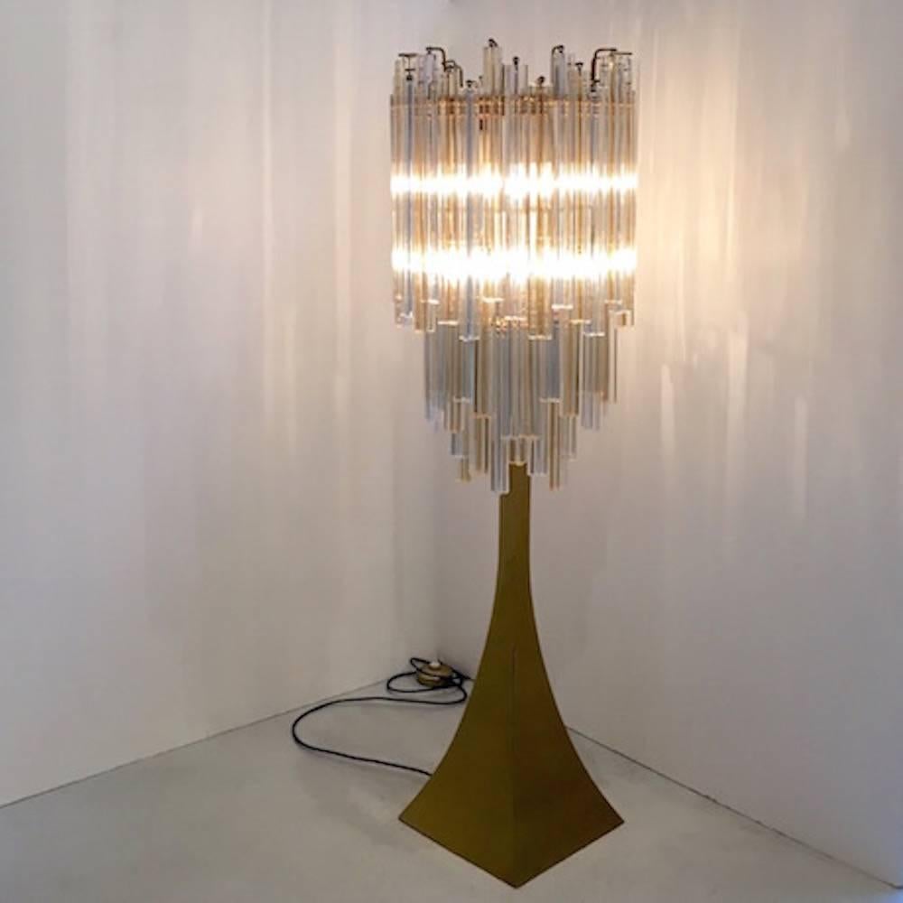 Important floor lamp designed by Toni Zuccheri for Venini Murano, 1970s.
Structure in brass and Murano blown crystals in two different colors.
Signed Venini. In excellent conditions  