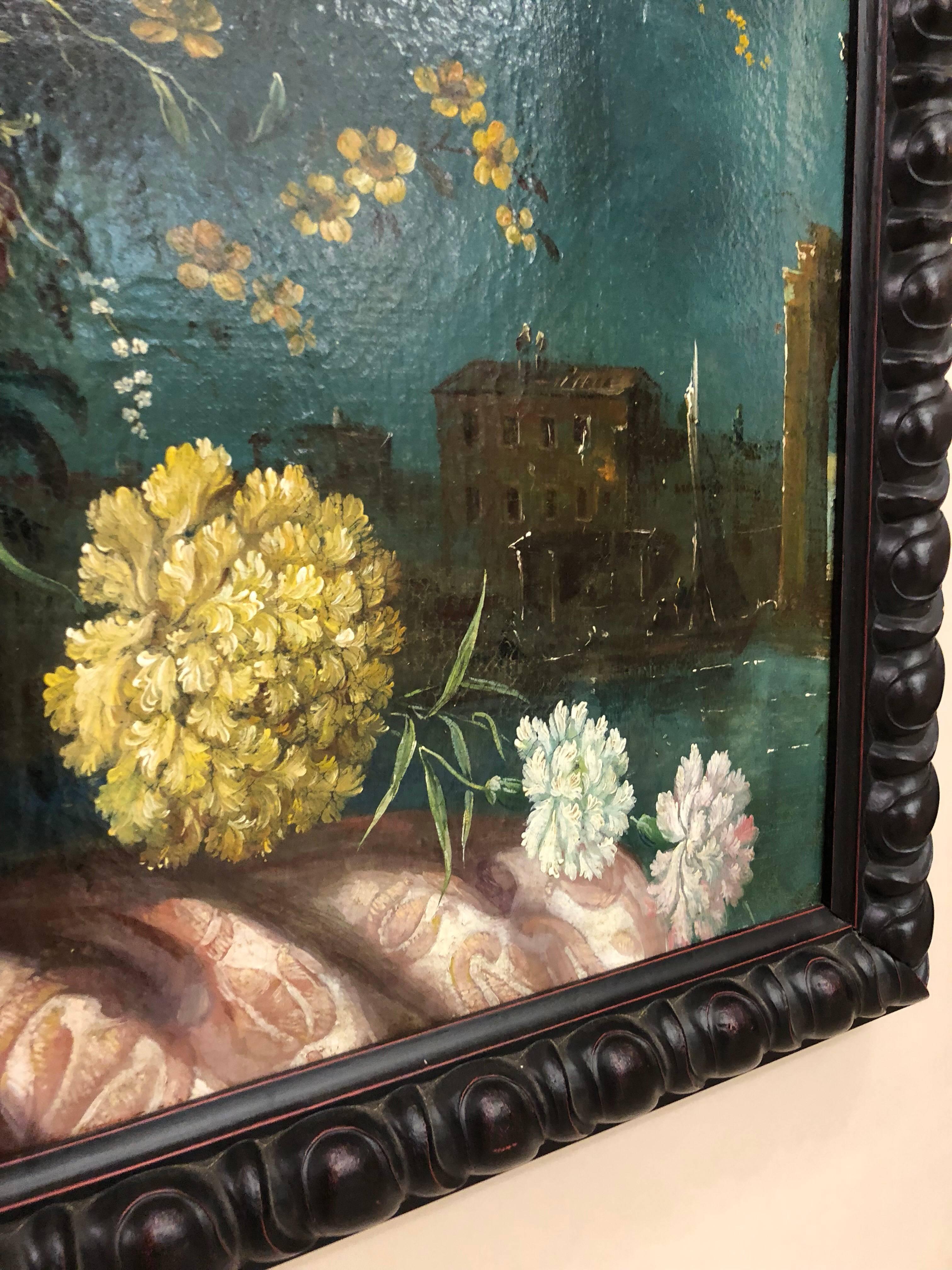 18th century oil on canvas, no signature visible.  Interesting composition with the abundant still life of flowers in the foreground and the moonlit canals of Venice in the background.  I’m very good overall condition with stable craqlure.  Housed