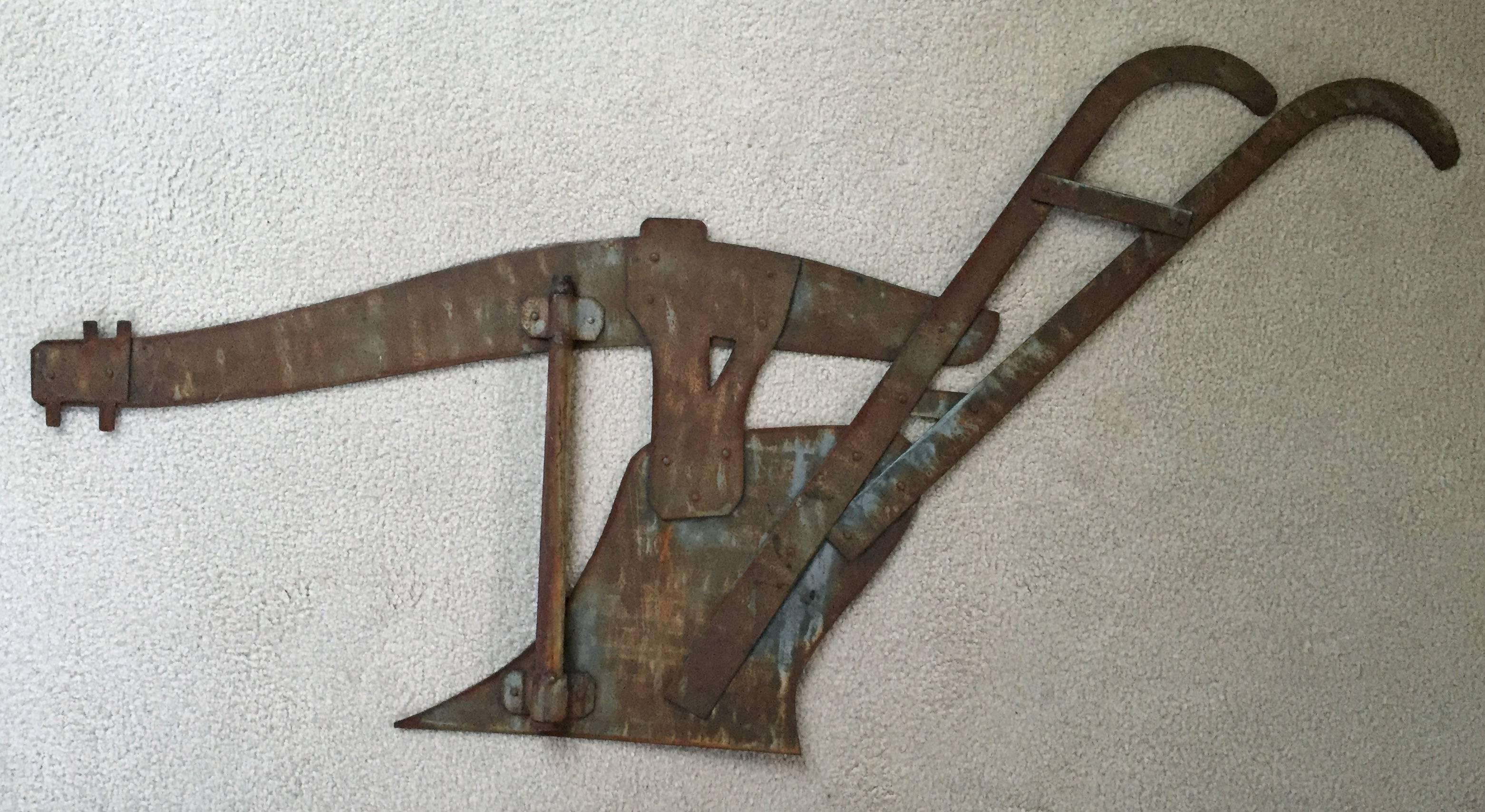 Rare 19th century sheet iron weathervane of a plow American. Large size.