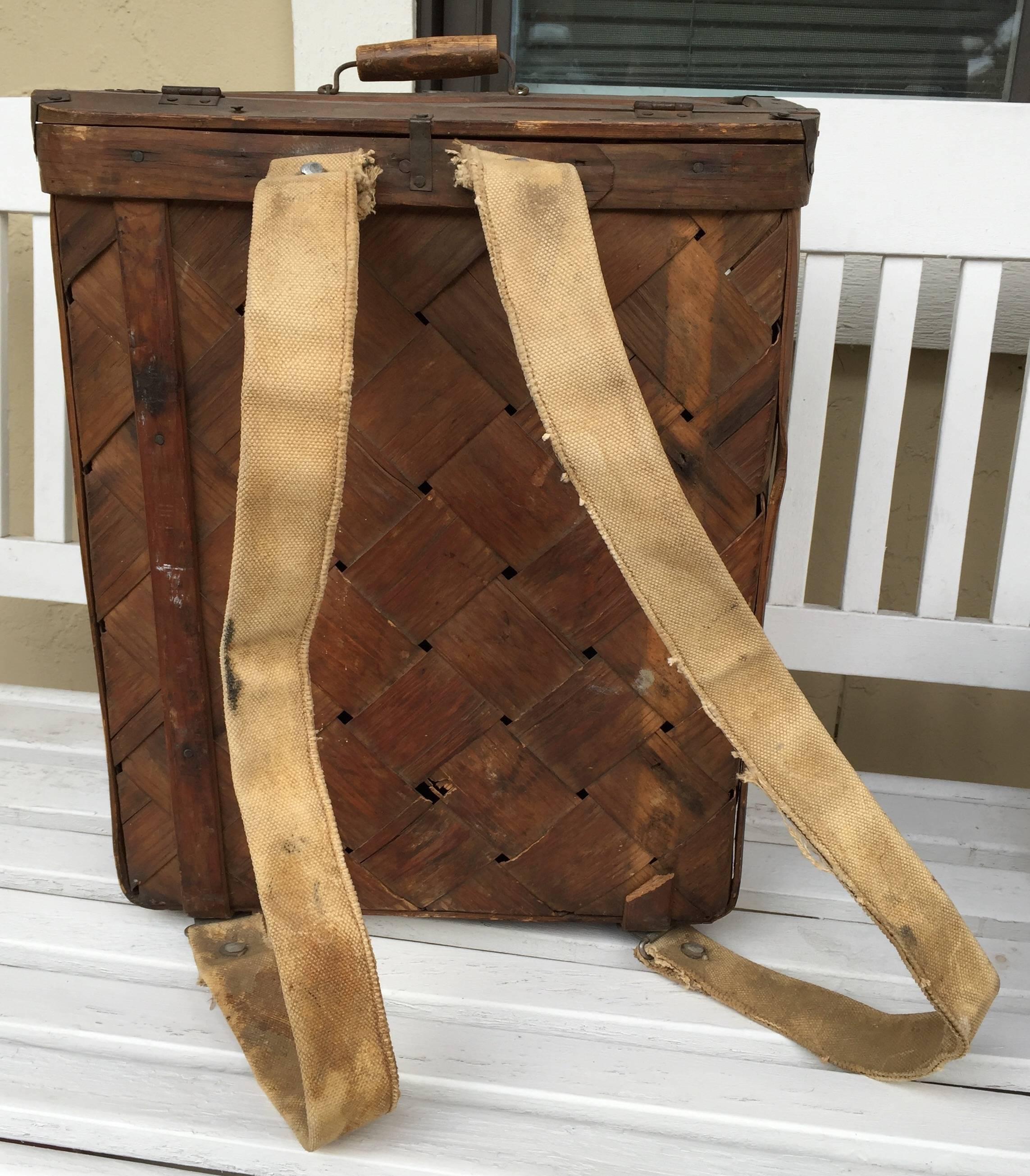 Wood woven camp back pack with early straps.