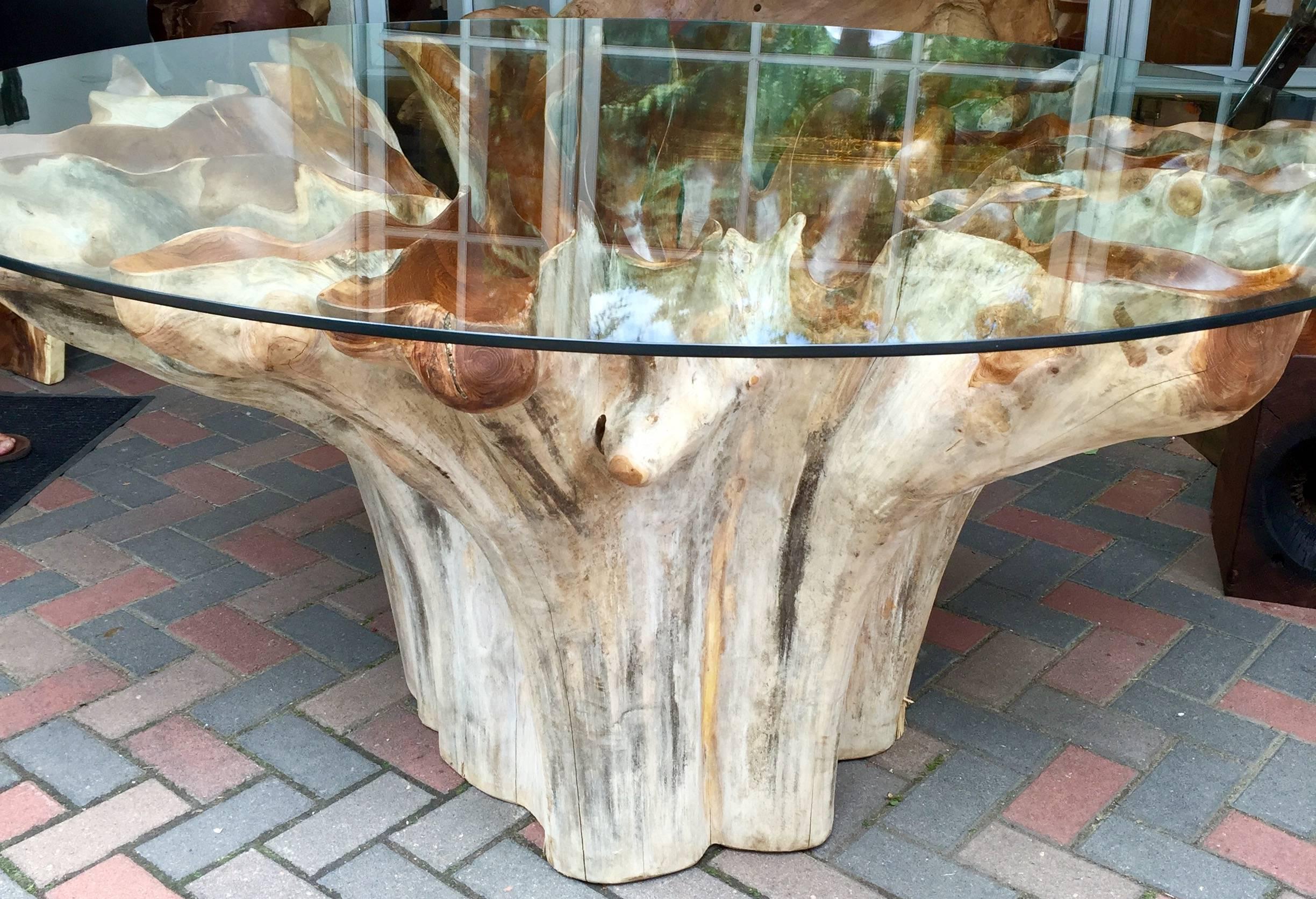 From Bali teak root ball, glass top.