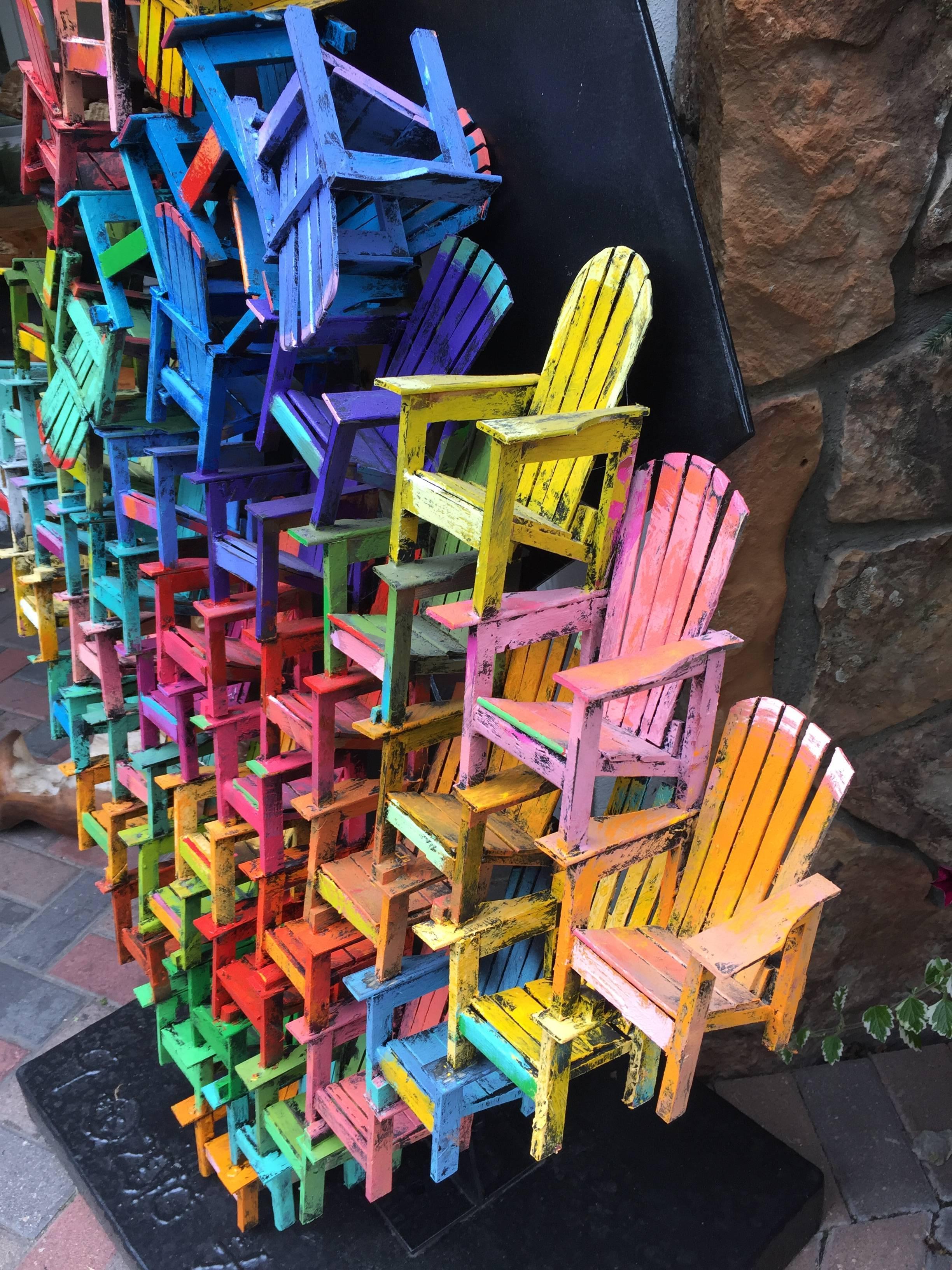 Paul Jacobsen uses everyday objects, such as chairs, cars, airplanes, trains, motorcycles and puzzles, all built from scratch and turns them into haunting and very desirable works of art. Among his most famous works are the Adirondack chair series,