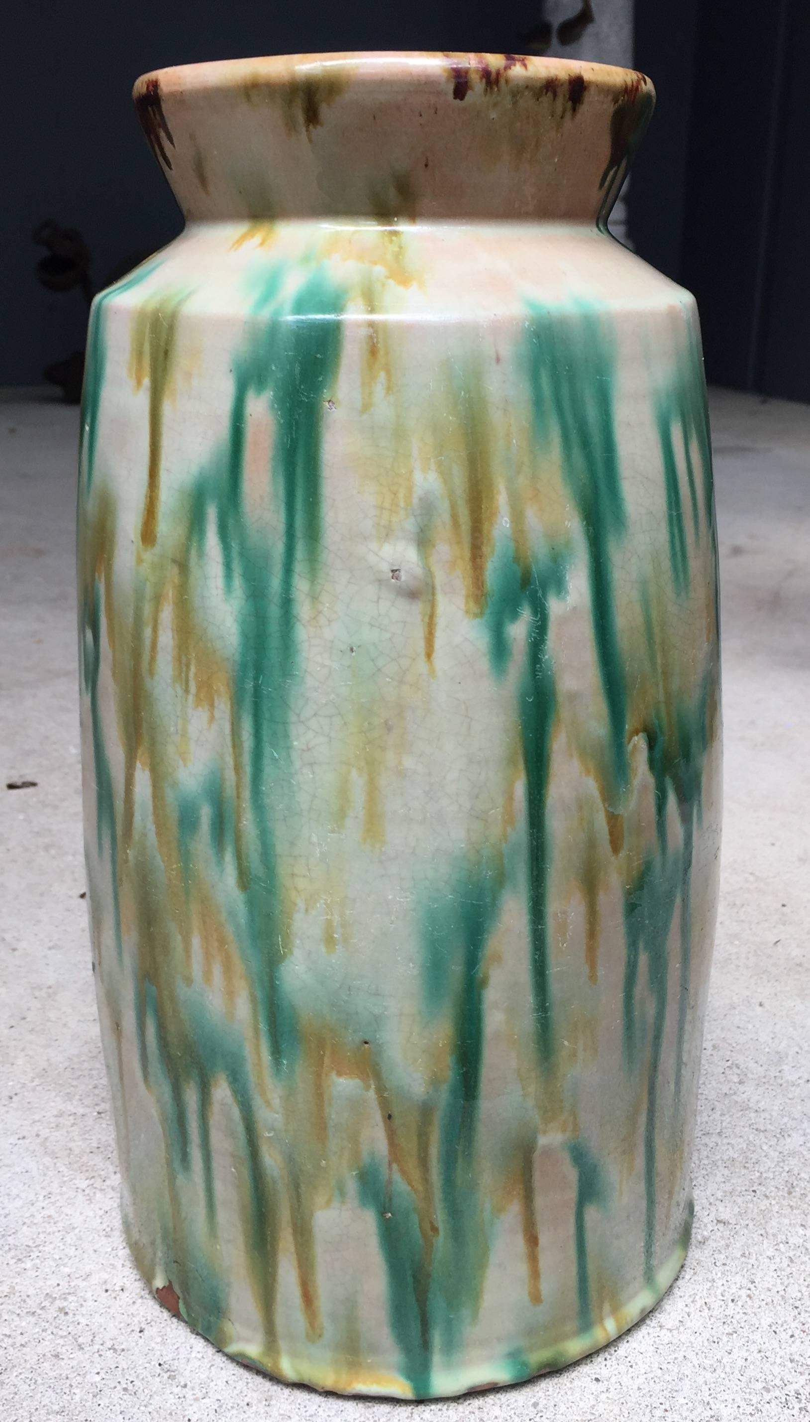 Shenandoah Valley, North Carolina, or New England in origin glazed jar with great green and brown dripped paint. In very good overall condition.