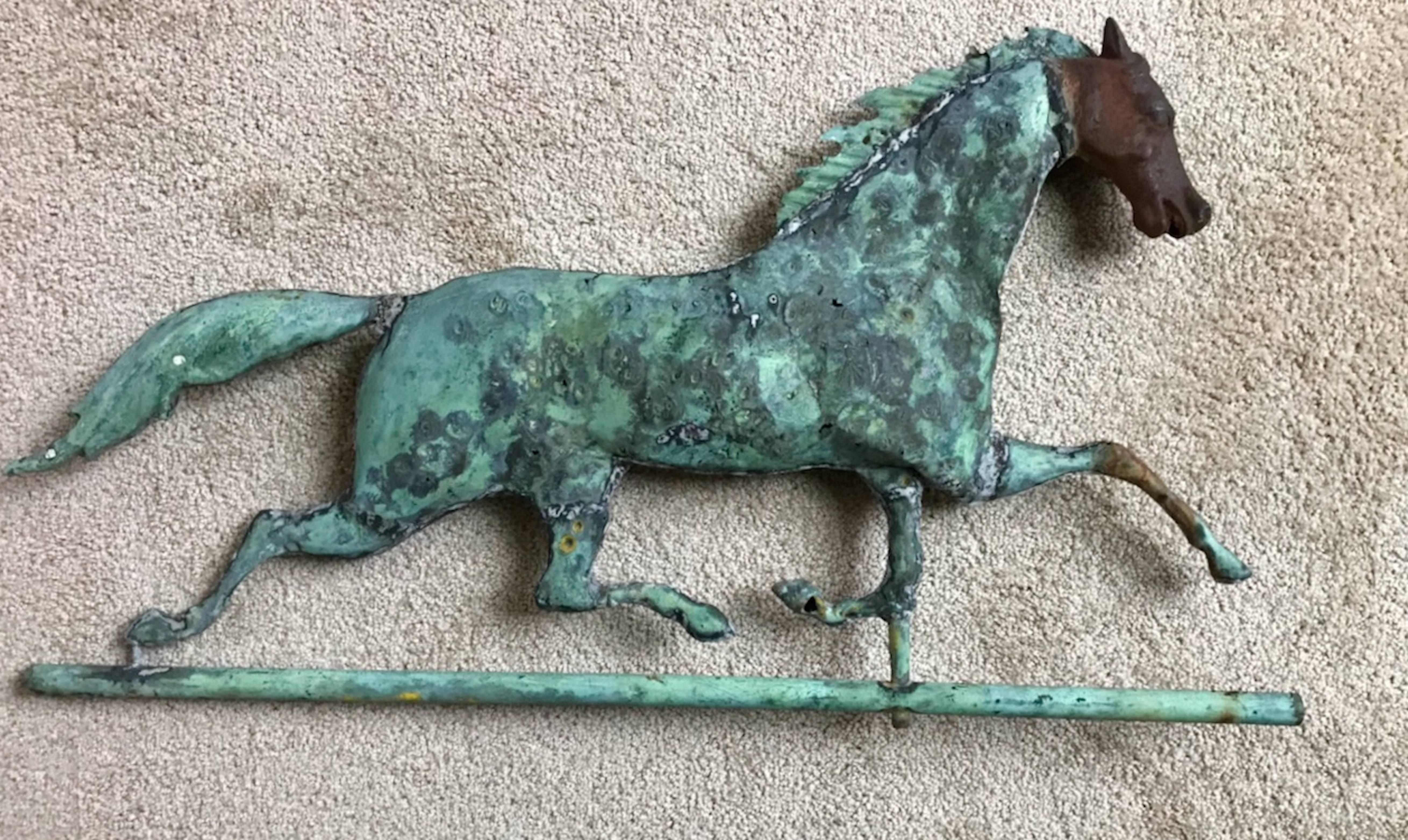 Great verdigris surface. In overall very good condition, some bullet holes with early repairs to one side.