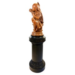 Una encantadora escultura de terracota patinada de finales del siglo XIX.