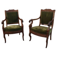 Pair of French antiques armchairs in walnut and green fabric 19th century