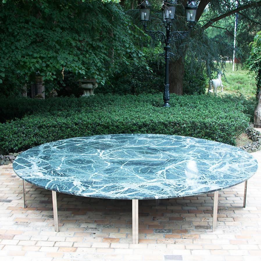 Beautiful green marble table, circa 1970
The table consists of 21 parts and is fully demountable.
Metal table-legs.


