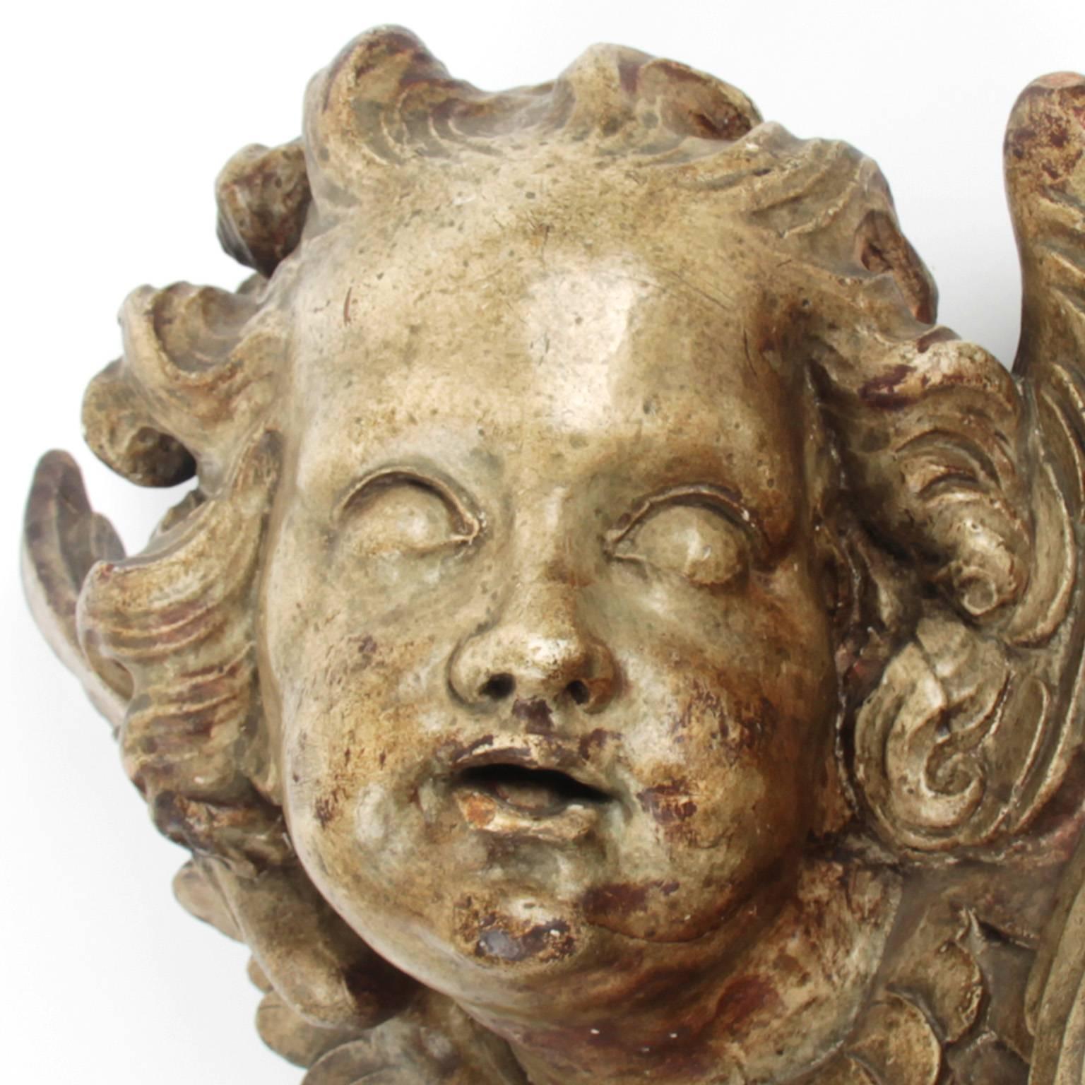 Terracotta angel head, circa 1800.