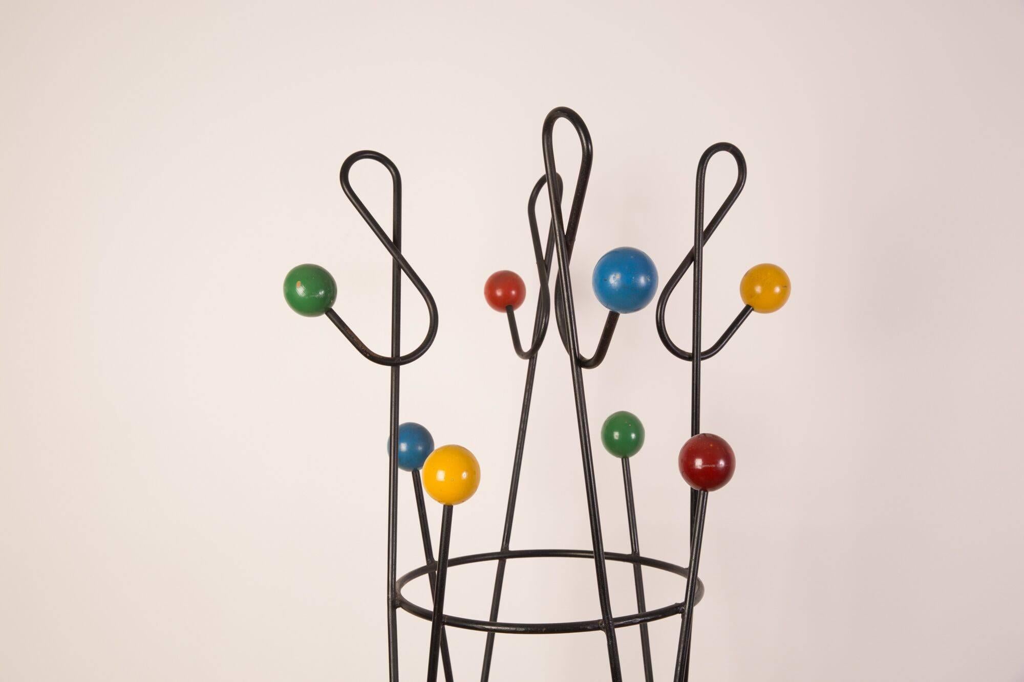 Amazingly clean Roger Feraud French iron coat stand.