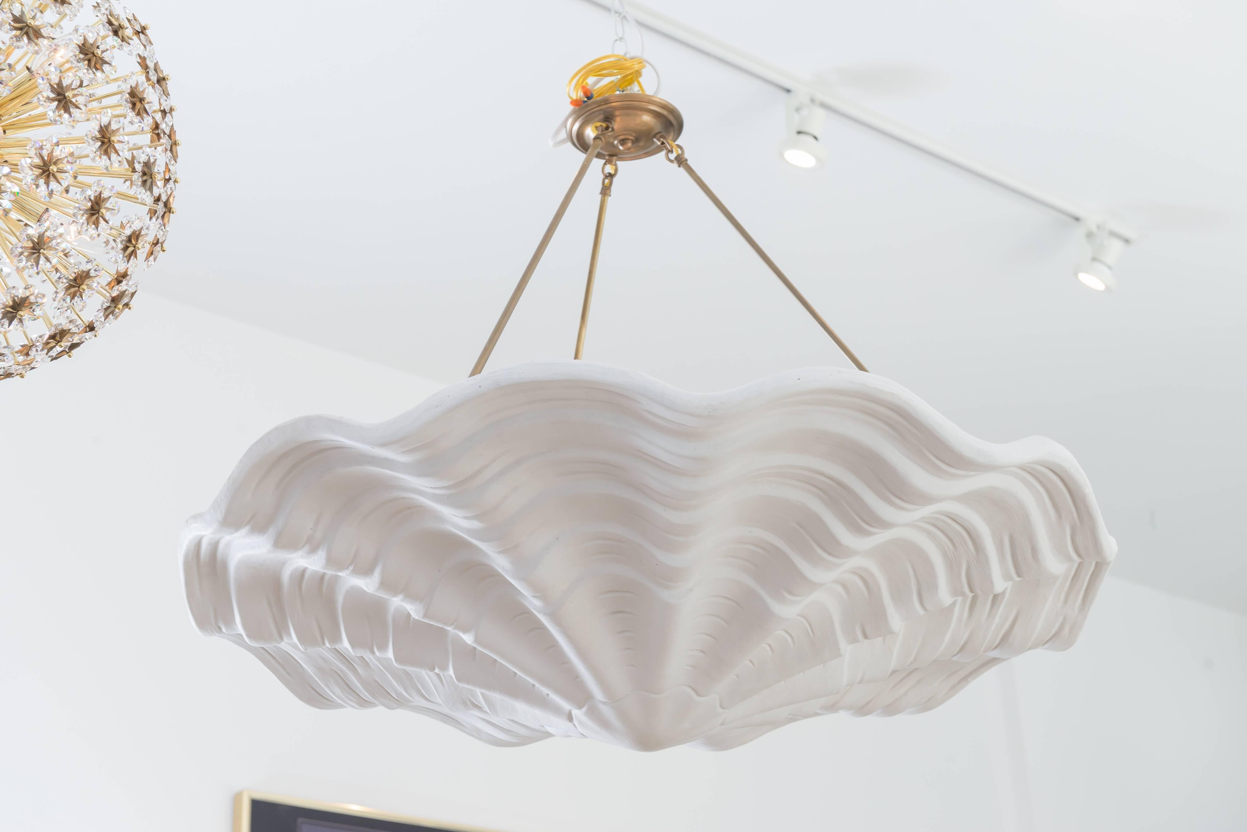 Styled in the manner of Frances Elkins 1930s plaster shell chandelier.