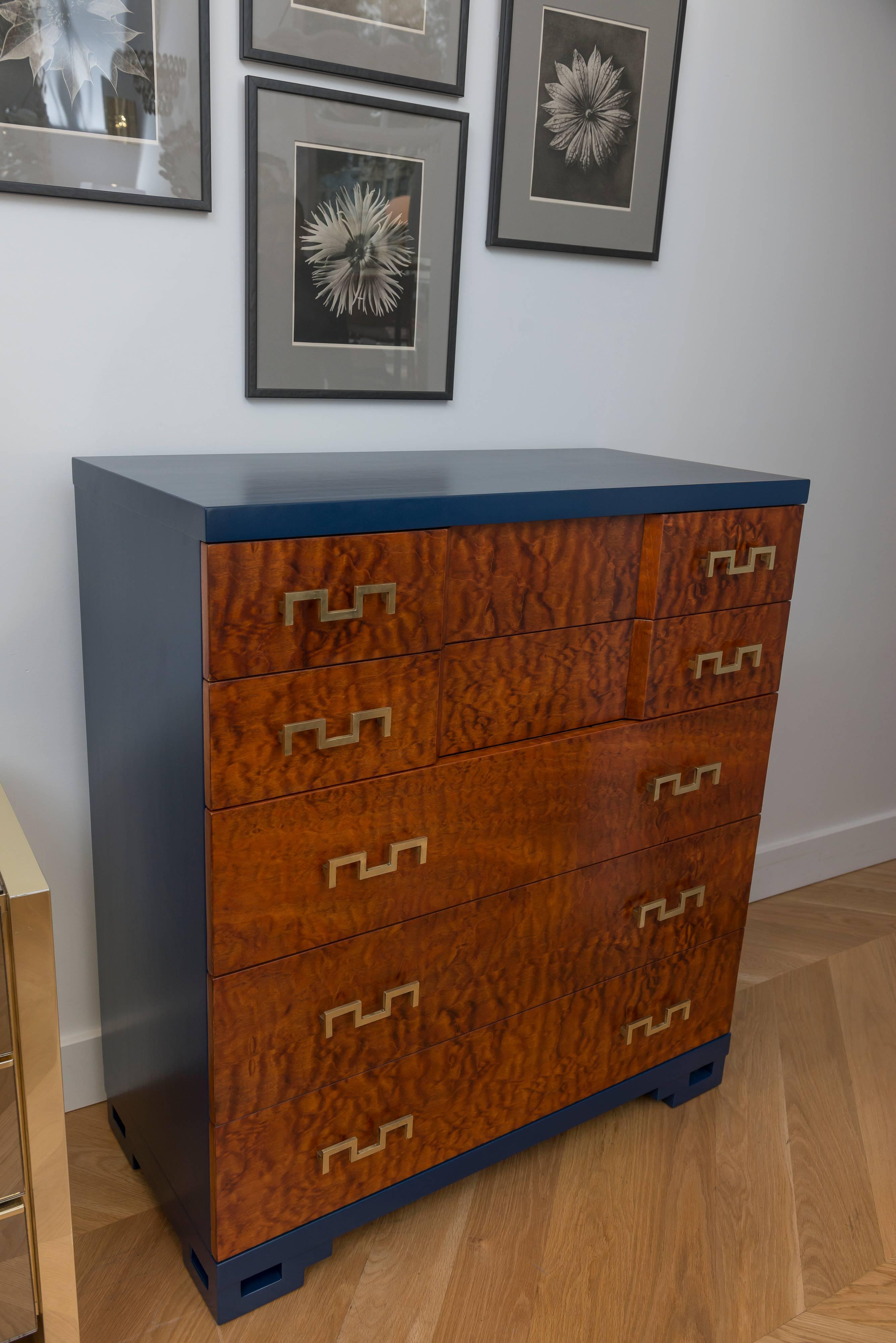 1950s blue lacquer and mahogany dresser in with solid brass drawer pulls with five drawers.