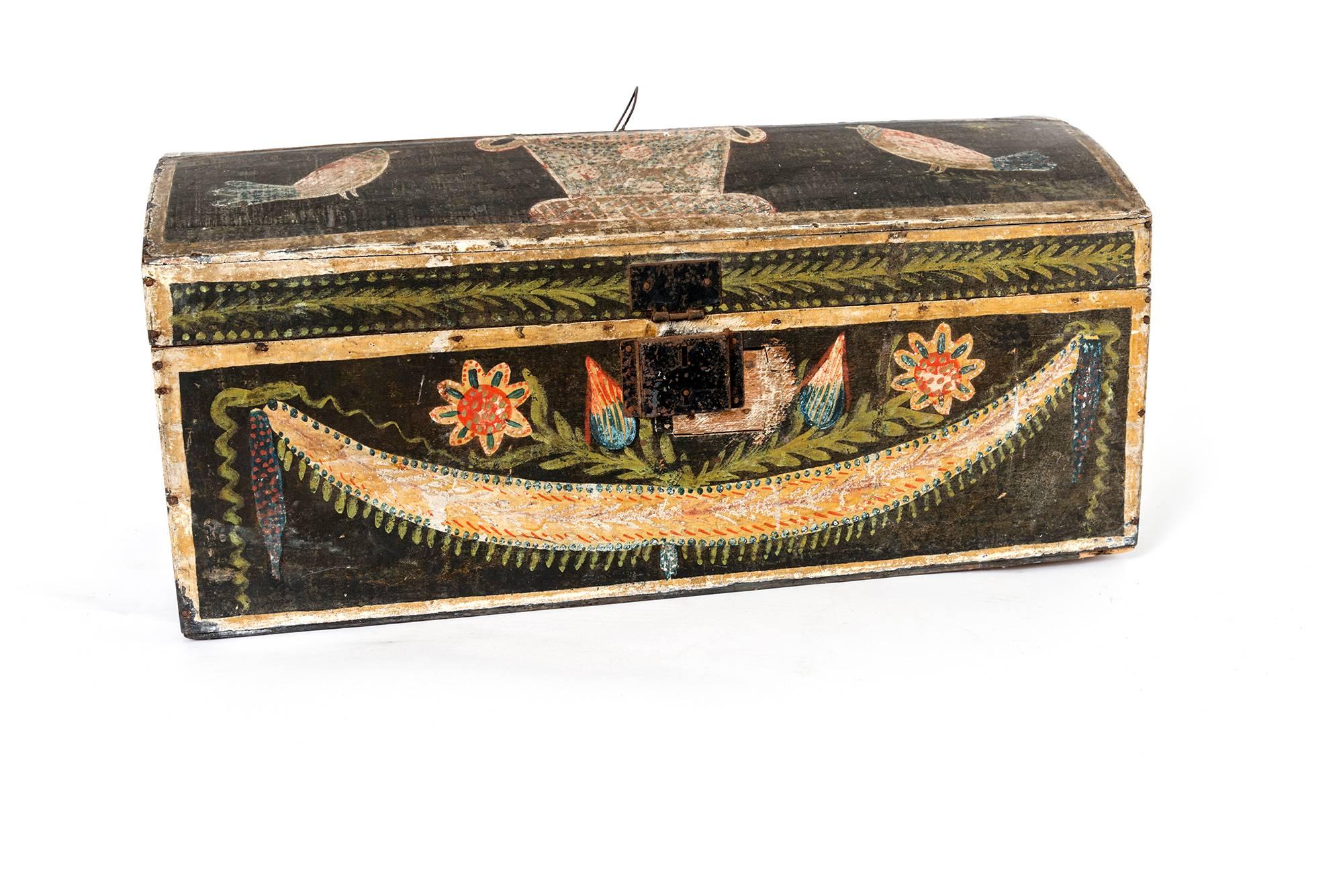 An Italian wedding box with intricate painted design throughout the box.