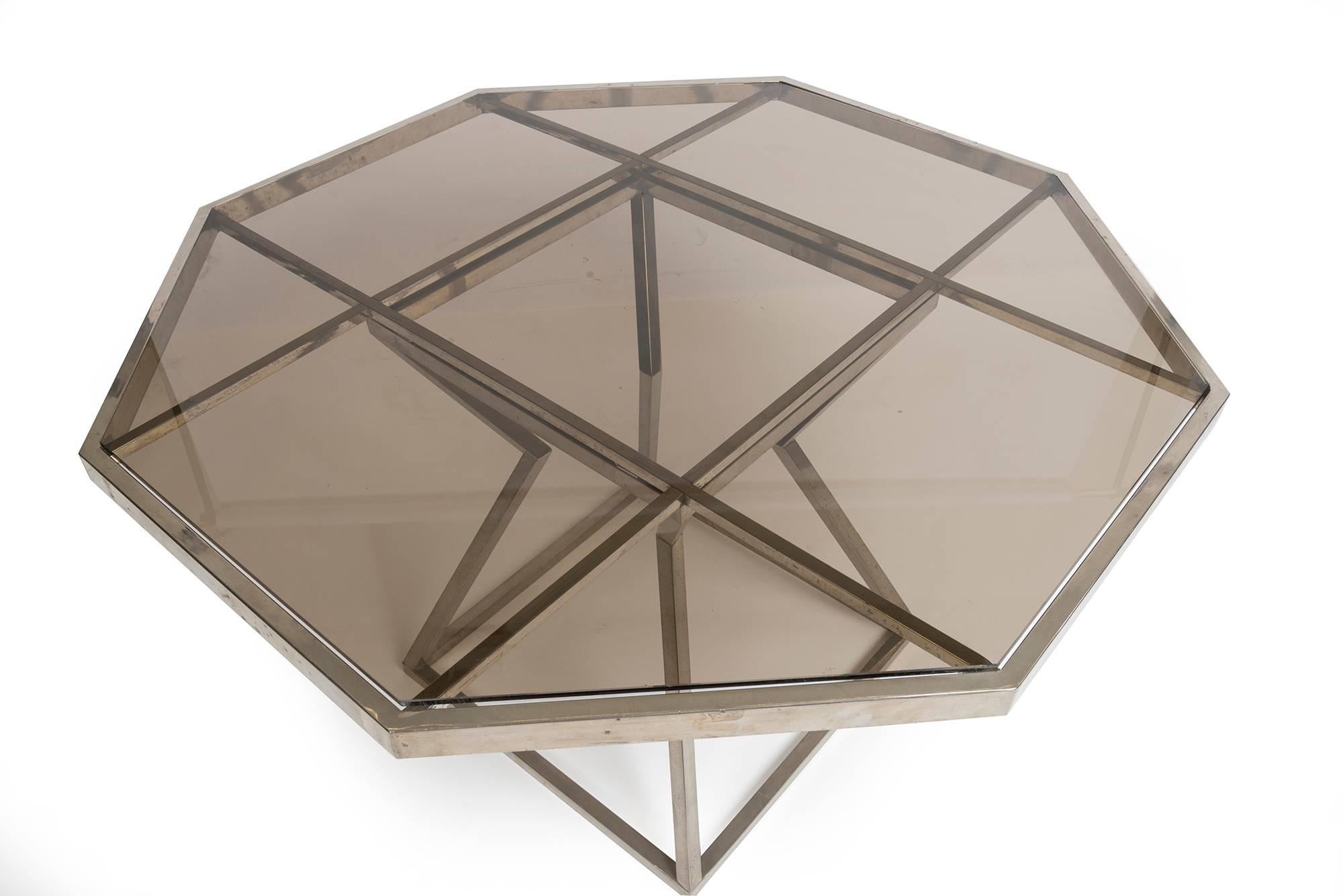 A rare Agente octagonal chrome and glass dining table dating to midcentury.