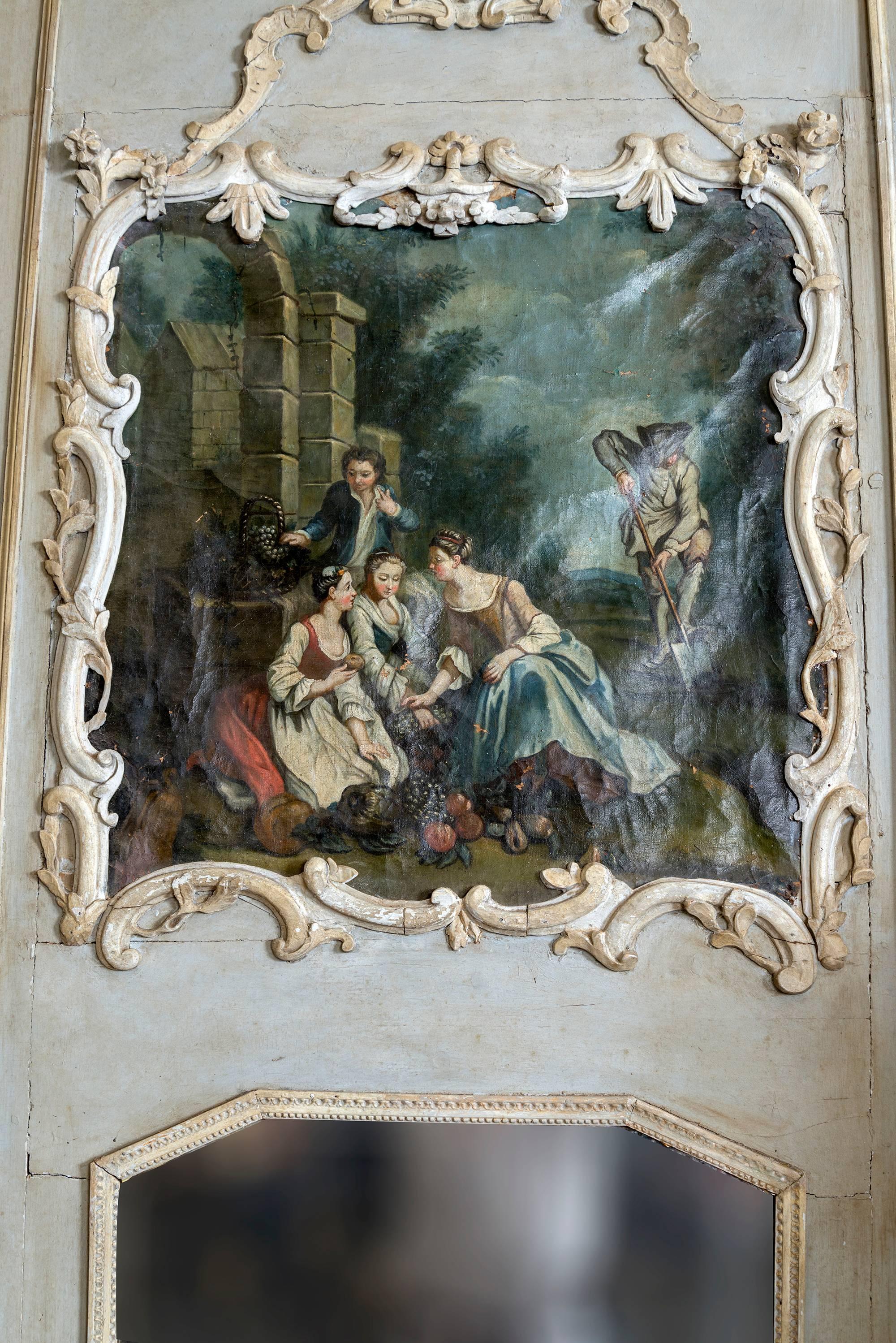 French, circa 1760
A blue painted Louis XV trumeau mirror with beautiful painting at the top.