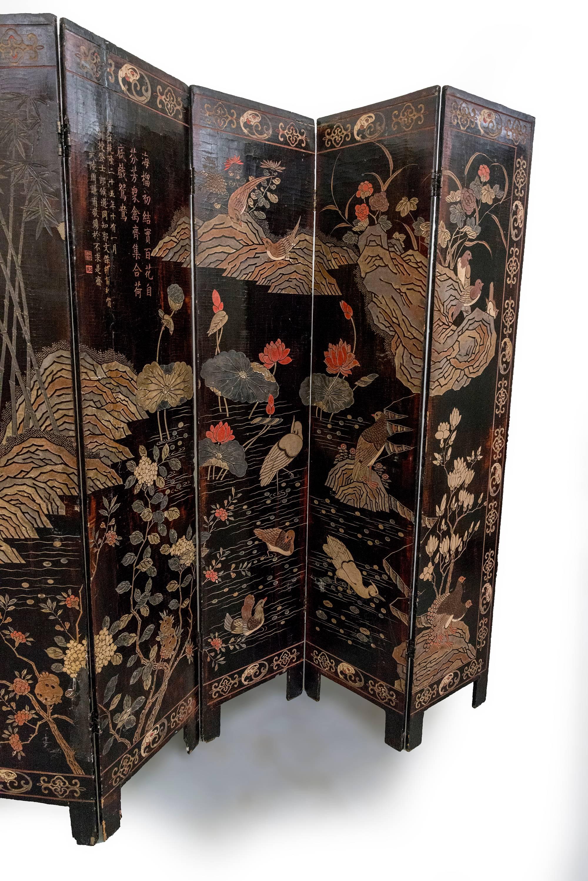 Chinoiserie Coromandel Screen with Carved Asian Paintings and Written Characters