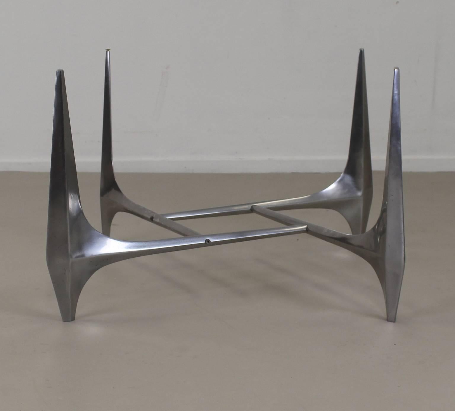 Nice sculptural German design coffee table
Designer: Knut Hesterberg
Manufacturer: Ronald Schmitt Germany
Brushed aluminium
Safety glass 1cm thick
