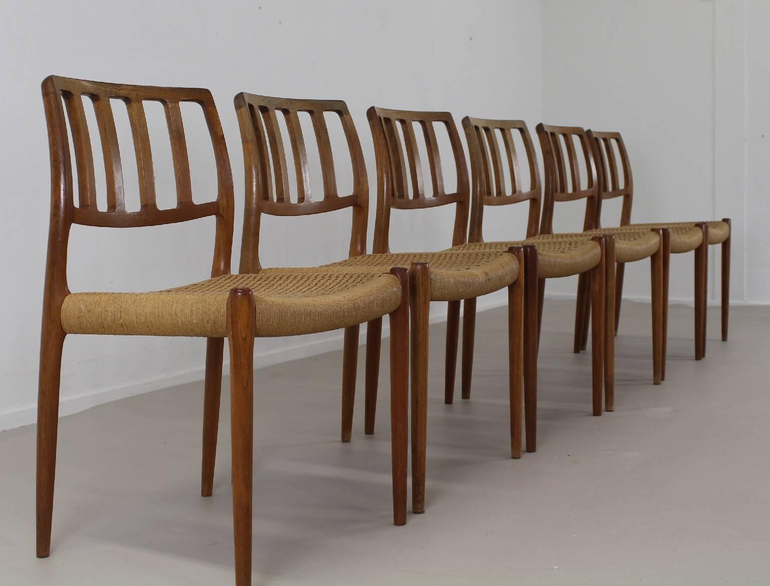 Teakwood chairs with a organic back.
Designed by Niels O. Møller 1974.
Teakwood with original papercord seating.
Marked: J.L. Møller Models.