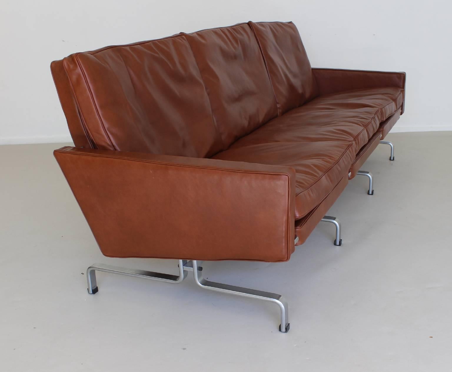 Beautiful executive design seating by Poul Kjaerholm.
Re upholstered in Ohmann classic saddle leather.
Steel manufacturer E Kold Christiansen.
A real masterpiece in excellent condition

 