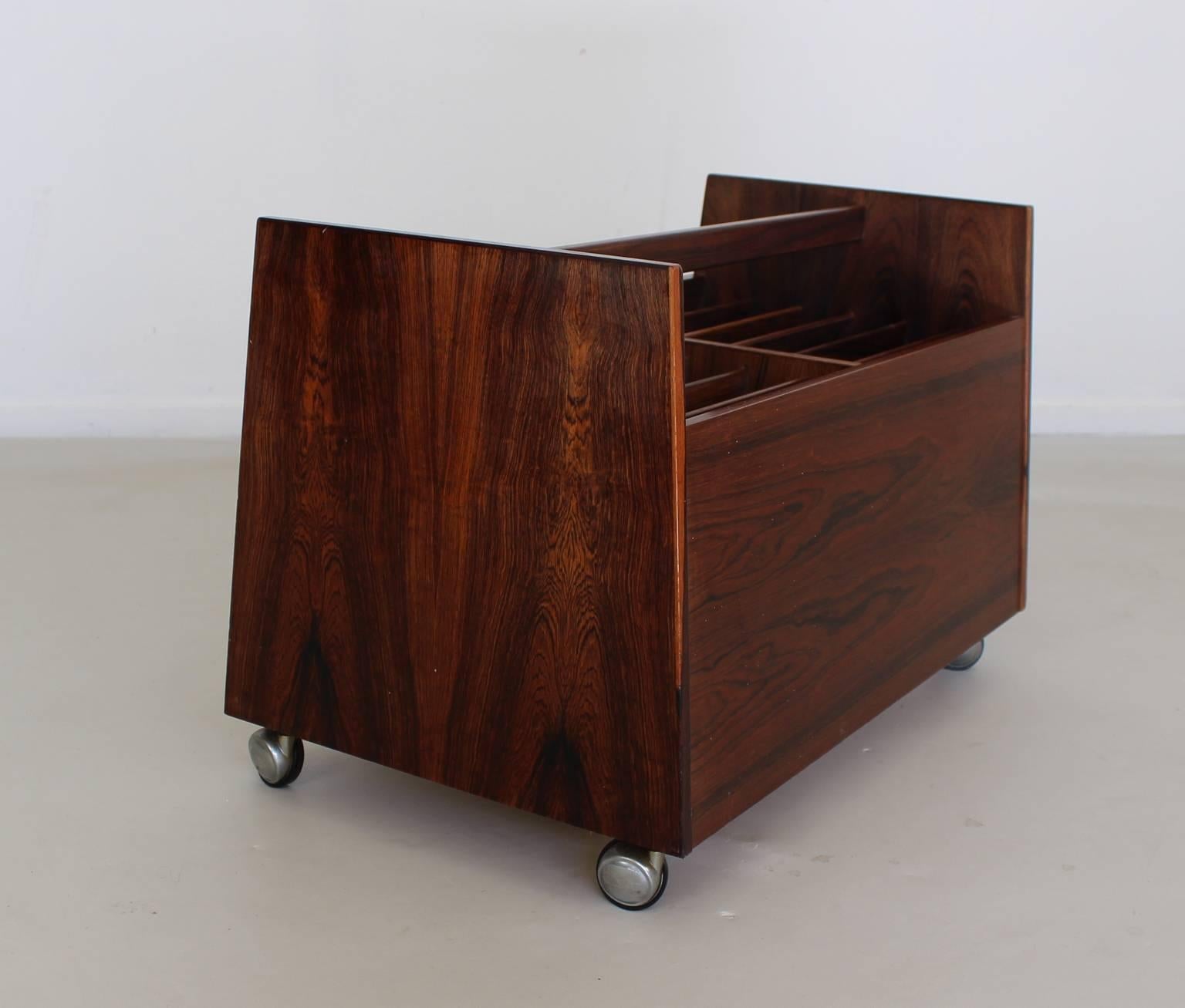 Superb designed record trolley storage.
Designer: Rolf Hesland.
Rosewood and rosewood veneer.
                     